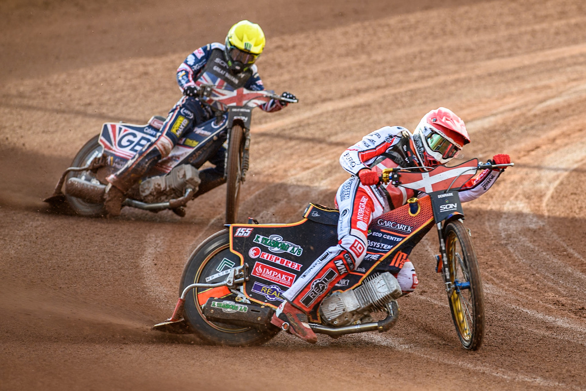 Mikkel Michelsen of Denmark in Red leading Dan Bewley of Great Britain in Yellow during the Monster Energy FIM Speedway of Nation Final at the National Speedway Stadium, Manchester on Saturday 13th July 2024. (Photo: Ian Charles | MI News)
