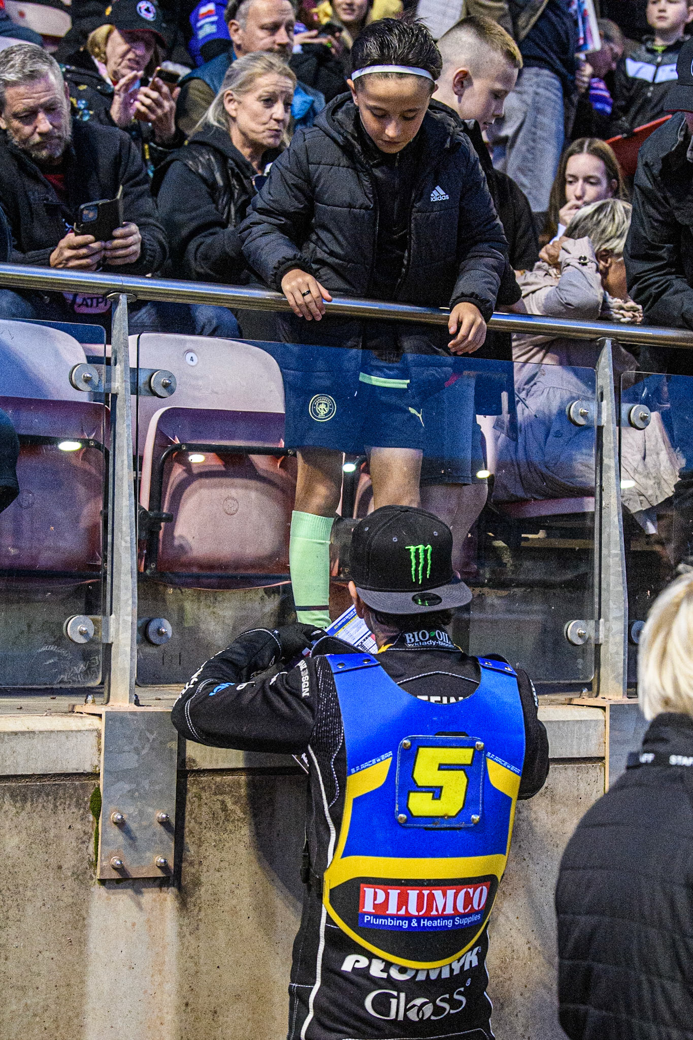 Tai Woffinden signs autographs for young fans during the Sports Insure Premiership match between Belle Vue Aces and Sheffield Tigers at the National Speedway Stadium, Manchester on Monday 7th August 2023. (Photo: Ian Charles | MI News)