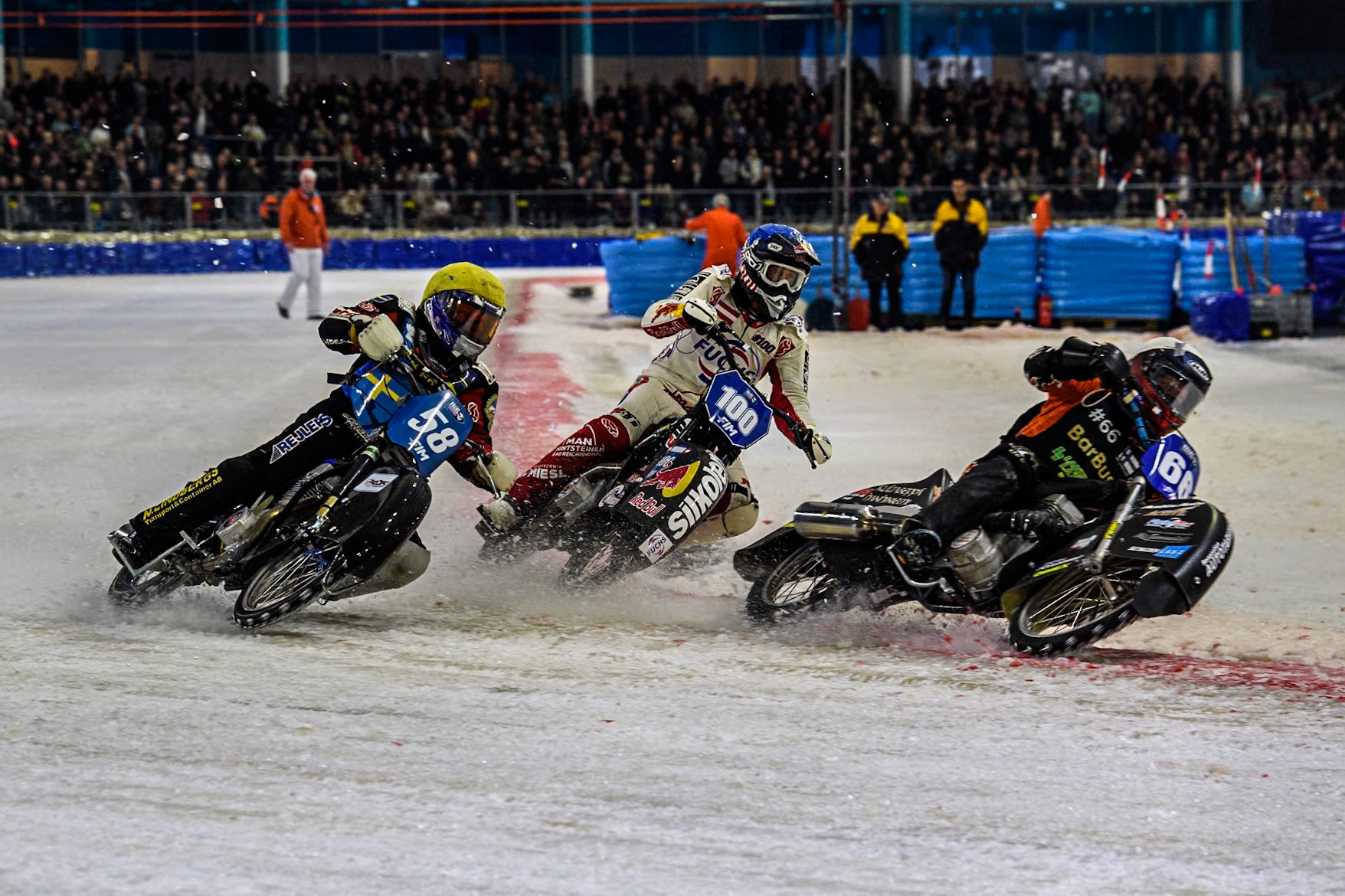 Finland's Aki Ala-Riihimäki (66) in White leading Sweden's Stefan Svensson (58) in Yellow and Austria's Franz Zorn (100) in Blue during the FIM Ice Speedway Gladiators World Championship Final 3 at Ice Rink Thialf, Heerenveen on Saturday 6th April 2024. (Photo: Ian Charles | MI News)