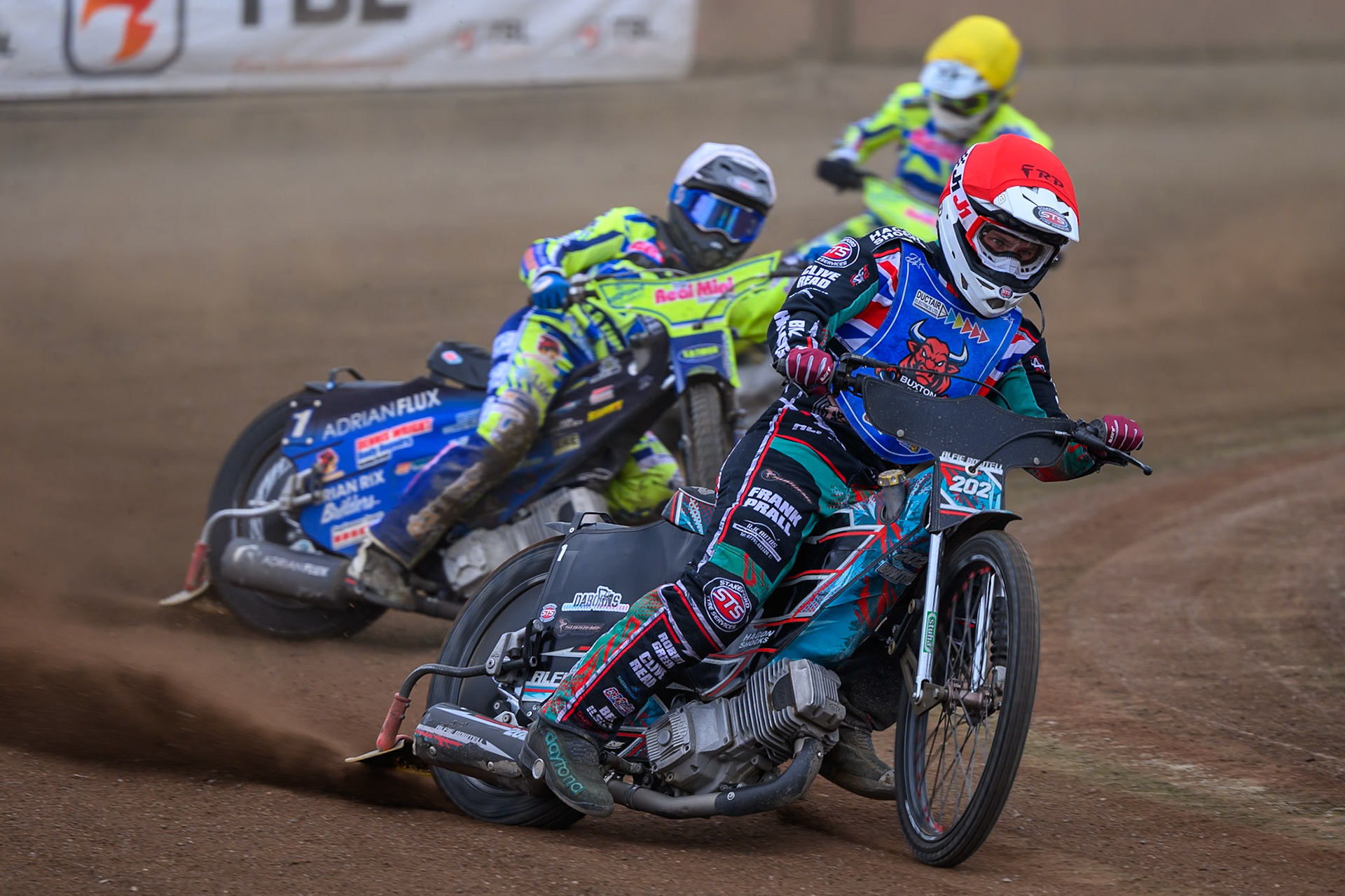 Alfie Bowtell of Buxton Bulls in Red leading Jody Scott of Oxford Chargers in White  and Darryl Ritchings of Oxford Chargers in Yellow during the WSRA National Development League match between Buxton Bulls and Oxford Chargers at Hi-Edge Speedway, Buxton on Sunday 2nd August 2026. (Photo: Ian Charles | MI News)