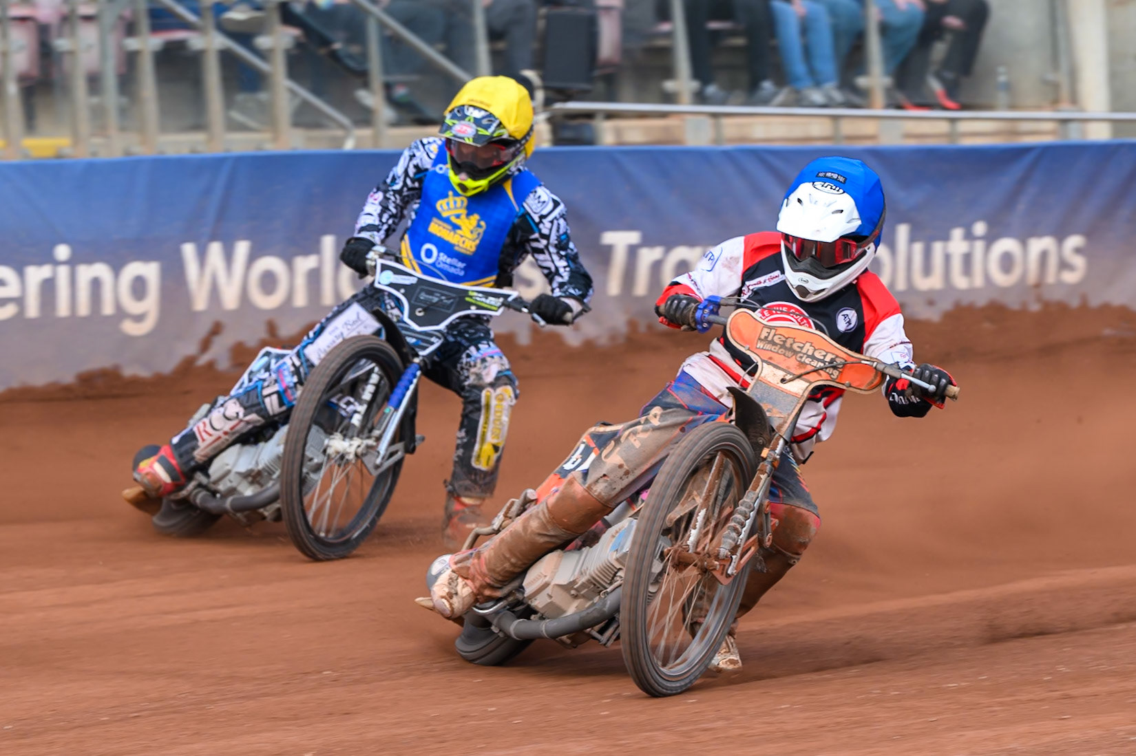 Belle Vue Colts' Harry Fletcher in Blue rides inside Monarchs' Luke Crang in Yellow during the WSRA National Development League match between Belle Vue Aces and Edinburgh Academy at the National Speedway Stadium, Manchester on Sunday 12th October 2025. (Photo: Ian Charles | MI News)