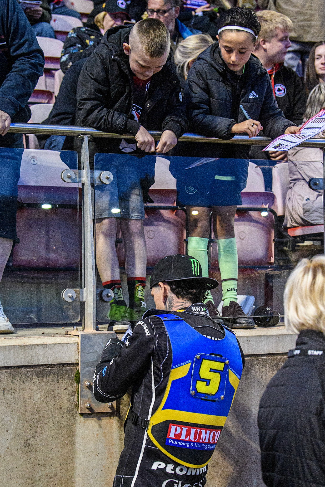 Tai Woffinden signs autographs for young fans during the Sports Insure Premiership match between Belle Vue Aces and Sheffield Tigers at the National Speedway Stadium, Manchester on Monday 7th August 2023. (Photo: Ian Charles | MI News)