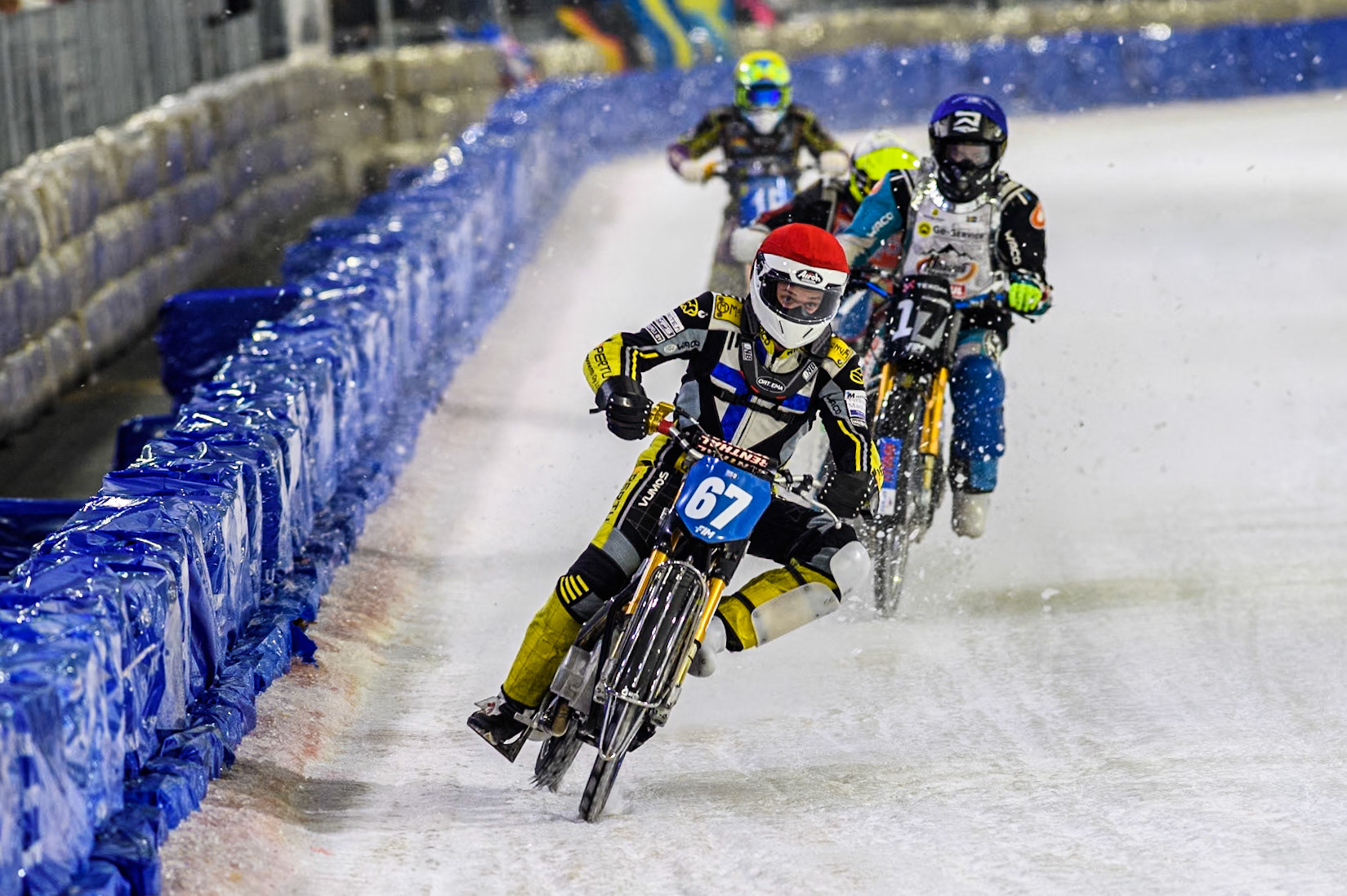 Finland's Heikki Huusko (67) in Red leading Reserve  Sweden's Filip Jäger (17) in Blue, Czech Republic's Andrej Diviš (107) in White and Germany's Maximillian Neidermaier (16) in Yellow during the FIM Ice Speedway Gladiators World Championship Final 4 at Ice Rink Thialf, Heerenveen on Sunday 7th April 2024. (Photo: Ian Charles | MI News)