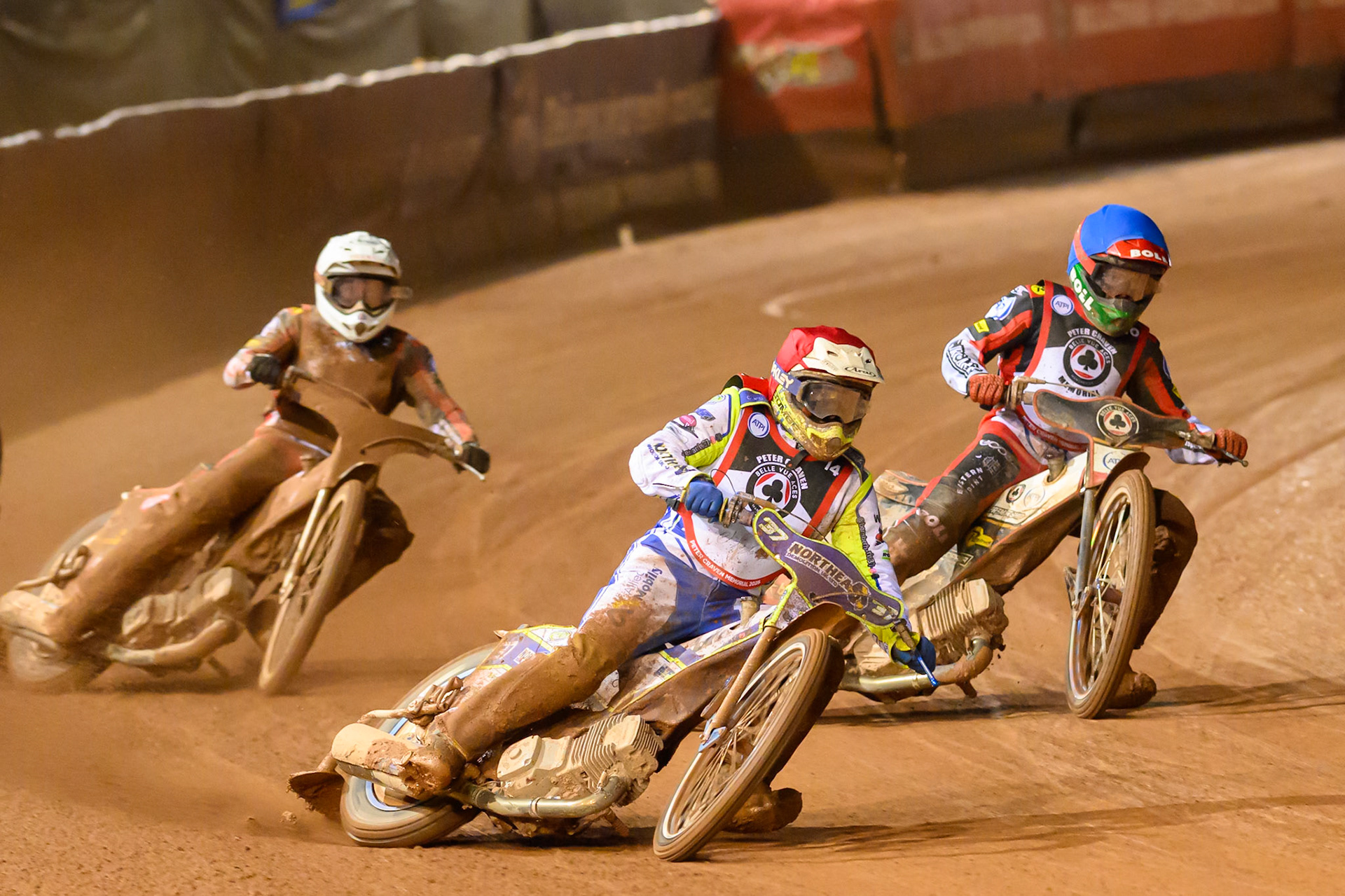 Chris Harris  in Red leading Brady Kurtz  in Blue and Peter Kildemand  in White during the Peter Craven Memorial Trophy at the National Speedway Stadium, Manchester, on Monday 16th March 2026. (Photo: Ian Charles | MI News)