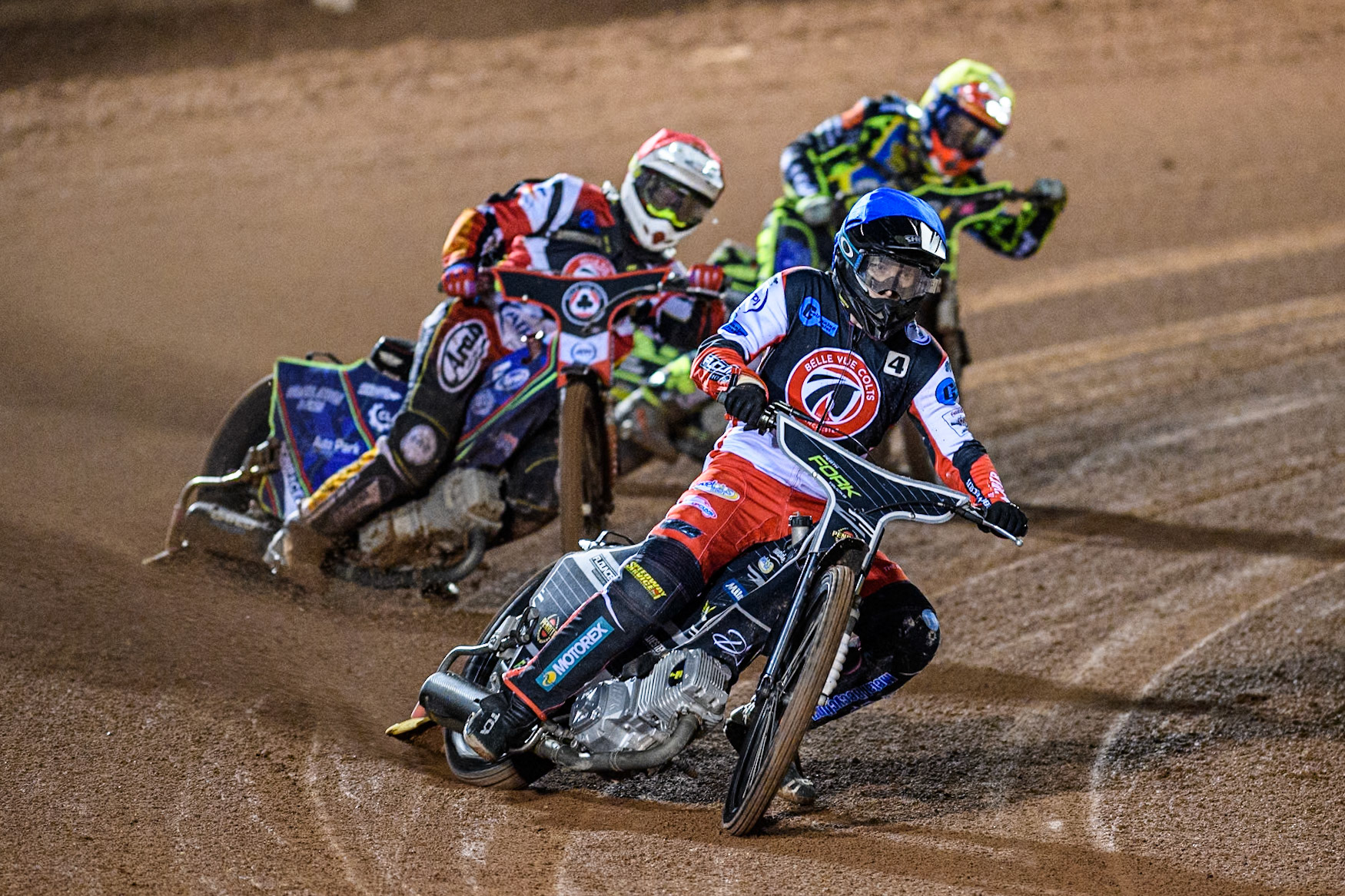 Belle Vue Colts' Matt Marson in Blue leading Belle Vue Colts' Guest Rider Jake Mulford in Red and Sheffield Cubs' Ace Pijper in Yellow during the WSRA National Development League match between Belle Vue Colts and Sheffield Tiger Cubs at the National Speedway Stadium, Manchester on Monday 7th October 2024. (Photo: Ian Charles | MI News)