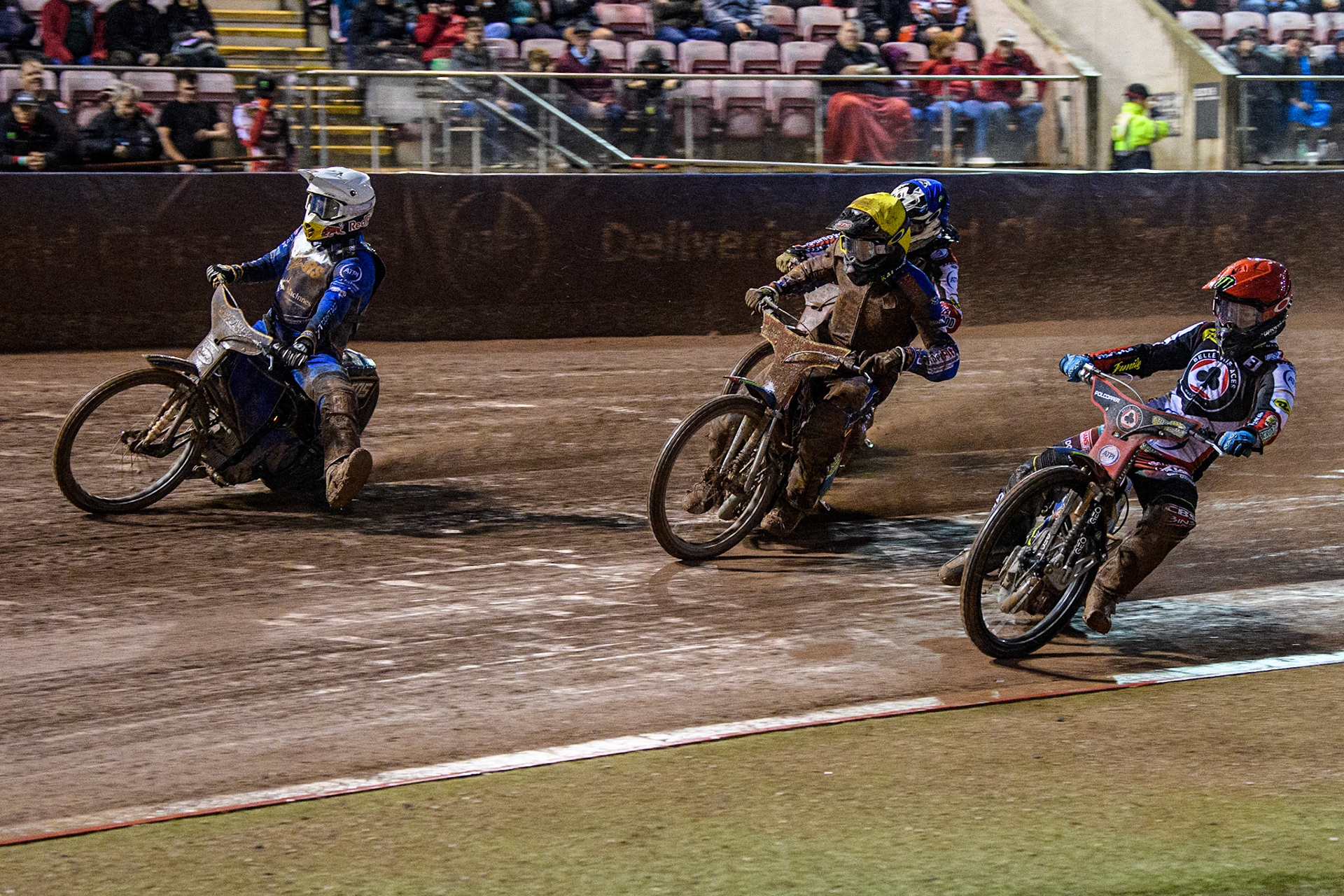 Jaimon Lidsey (Red) inside Simon Lambert (Yellow) and Robert Lambert (White) with Connor Bailey (Blue) behind during the Sports Insure Premiership match between Belle Vue Aces and King's Lynn Stars at the National Speedway Stadium, Manchester on Monday 21st August 2023. (Photo: Ian Charles | MI News)