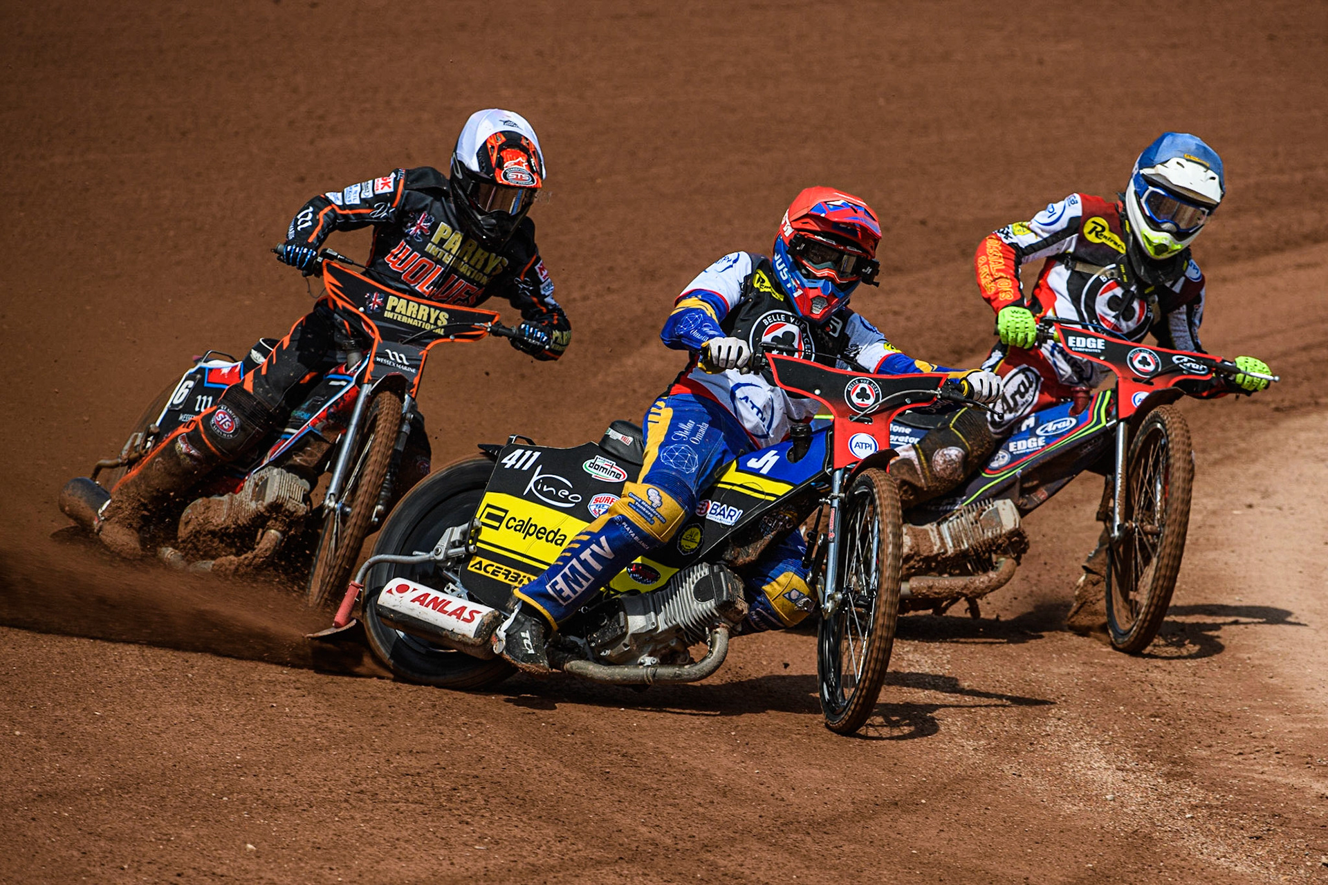 Paco Castagna (Red) leads Jake Mulford (Blue) and Zach Cook (White) during the Sports Insure Premiership match between Belle Vue Aces and Wolverhampton Wolves at the National Speedway Stadium, Manchester on Monday 29th May 2023. (Photo: Ian Charles | MI News)