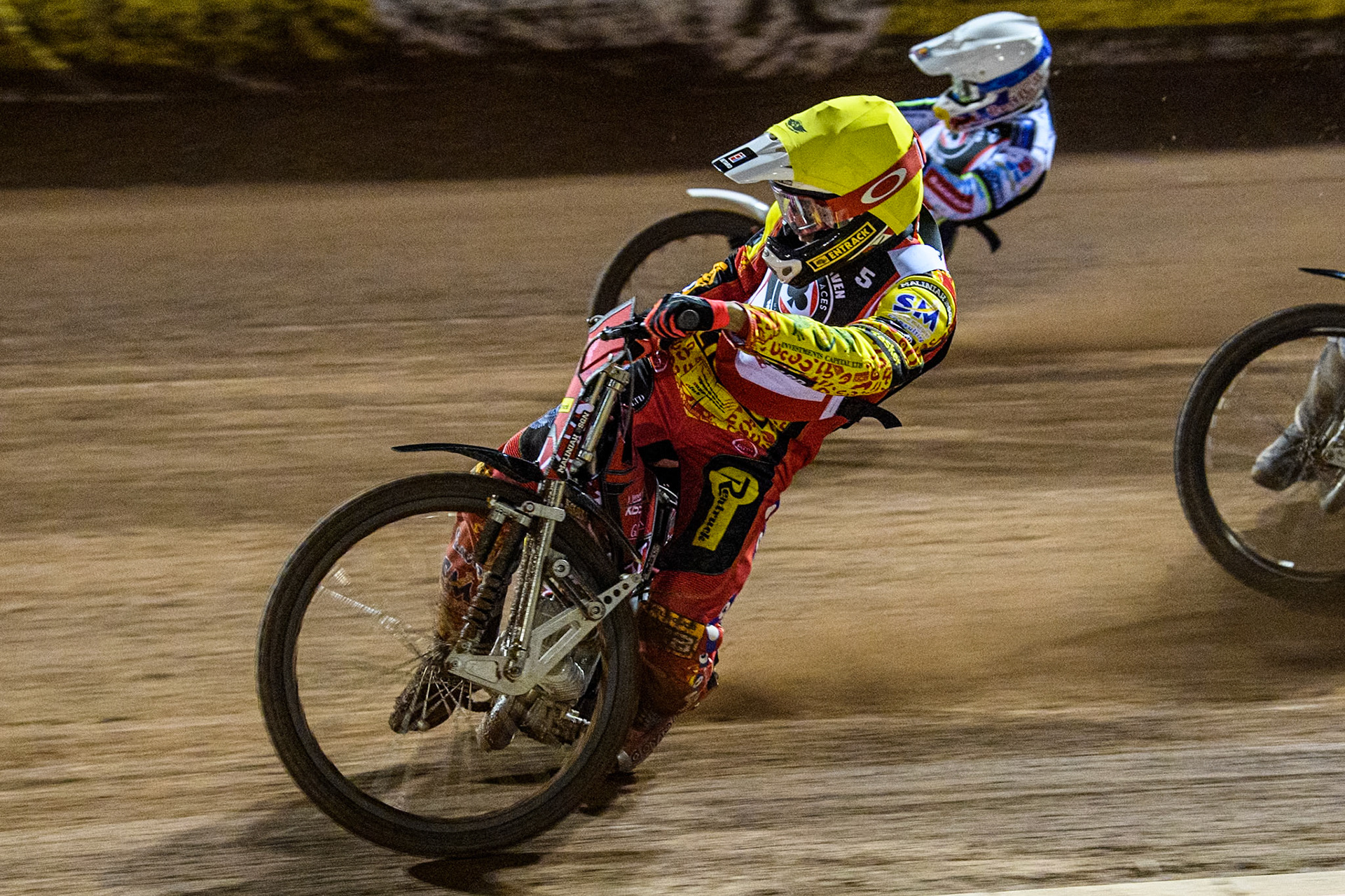Australia's Max Fricke (Yellow) inside Poland’s Maceij Janowski (White) during the Peter Craven Memorial Trophy meeting at the National Speedway Stadium, Manchester on Monday 18th March 2024. (Photo: Ian Charles | MI News)