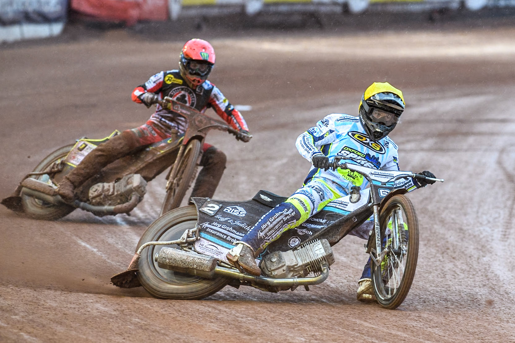 Oxford Spires' Erik Riss in Yellow leading Belle Vue Aces' Jaimon Lidsey in Red during the Rowe Motor Oil Premiership match between Belle Vue Aces and Oxford Spires at the National Speedway Stadium, Manchester on Monday 13th May 2024. (Photo: Ian Charles | MI News)