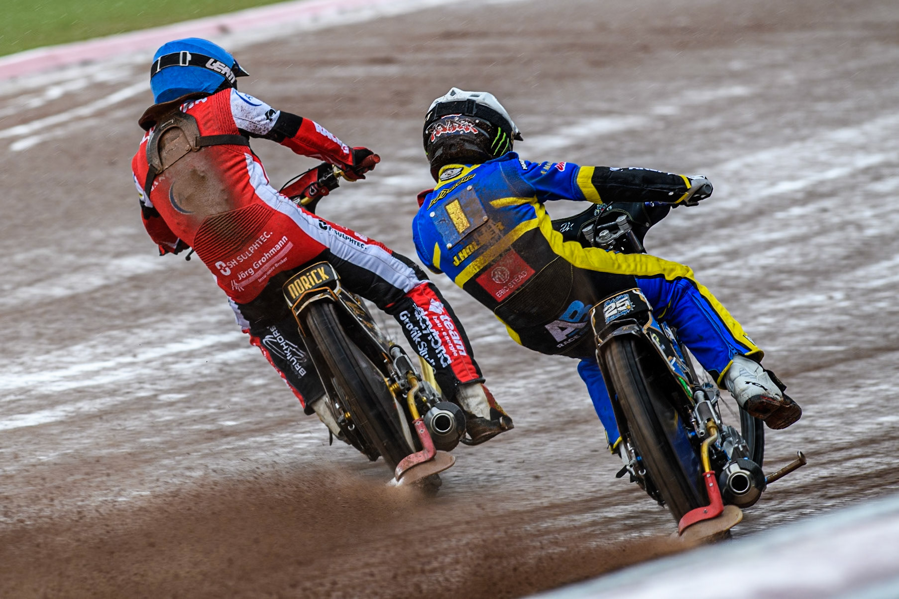 Belle Vue Aces' Norick Blodorn in Blue leading Sheffield Tigers' Jack Holder in White during the Rowe Motor Oil Premiership match between Belle Vue Aces and Sheffield Tigers at the National Speedway Stadium, Manchester on Monday 27th May 2024. (Photo: Ian Charles | MI News)