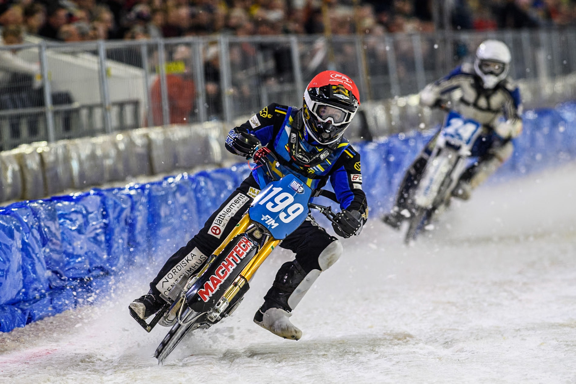 Sweden's Martin Haarahiltunen (199)  (L to R) leading Finland's Max Koivula (24) in White during the FIM Ice Speedway Gladiators World Championship Final 4 at Ice Rink Thialf, Heerenveen on Sunday 7th April 2024. (Photo: Ian Charles | MI News)