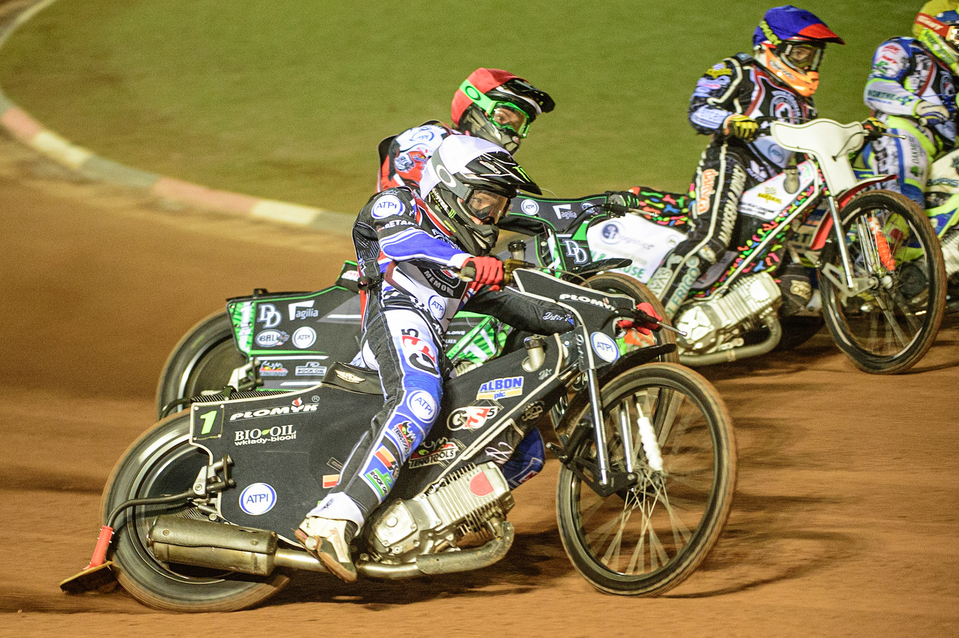 MANCHESTER, UK. MAR 21ST. Dan Bewley (White) outside Charles Wright (Red), Niels-Kristian Iversen (Blue) and Chris Harris (Yellow) during the ATPI Peter Craven Memorial Trophy at the National Speedway Stadium, Manchester on Monday 21st March 2022. (Credit: Ian Charles | MI News)