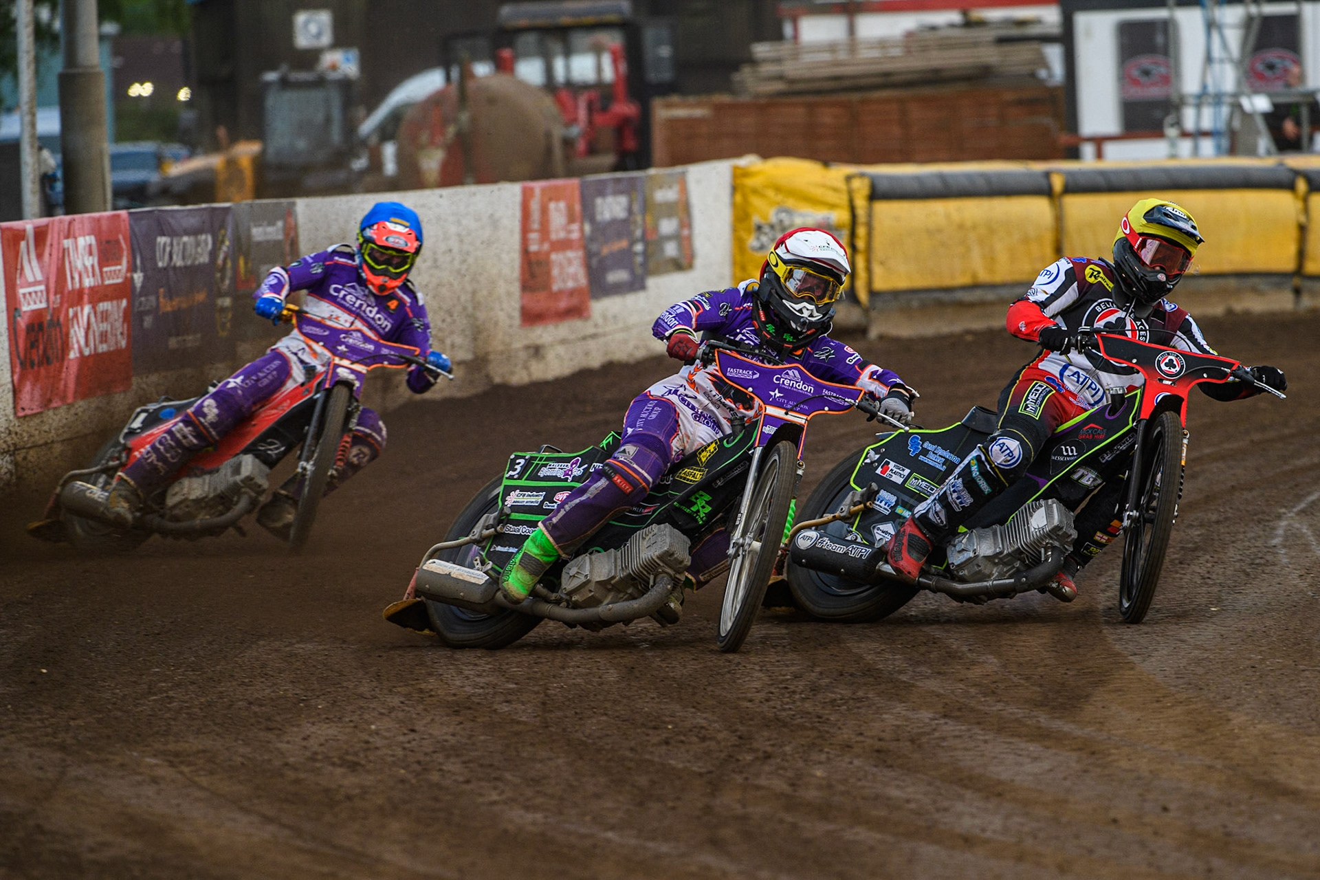 Benjamin Basso (Red) leads Tom Brennan (Yellow) and Richie Worrall (Blue) during the Sports Insure Premiership match between Peterborough and Belle Vue Aces at East of England Showground, Peterborough on Monday 26th June 2023. (Photo: Ian Charles | MI News)
