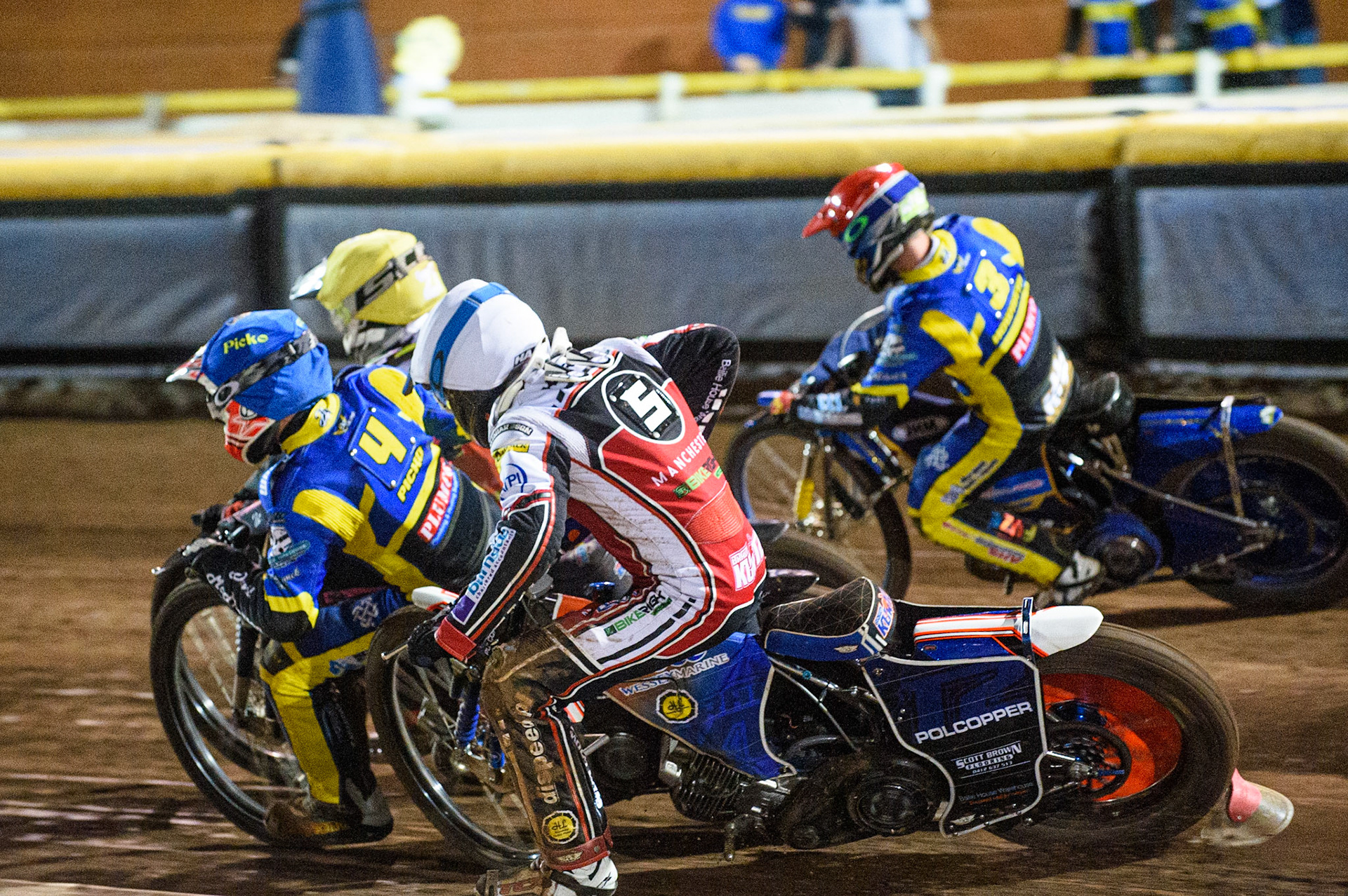 SHEFFIELD, UK. AUG 2NDBrady Kurtz  (White) is shut down on the first turn by Josh Pickering   (Blue) during the SGB Premiership match between Sheffield Tigers and Belle Vue Aces at Owlerton Stadium, Sheffield on Thursday 2nd September 2021. (Credit: Ian Charles | MI News)
