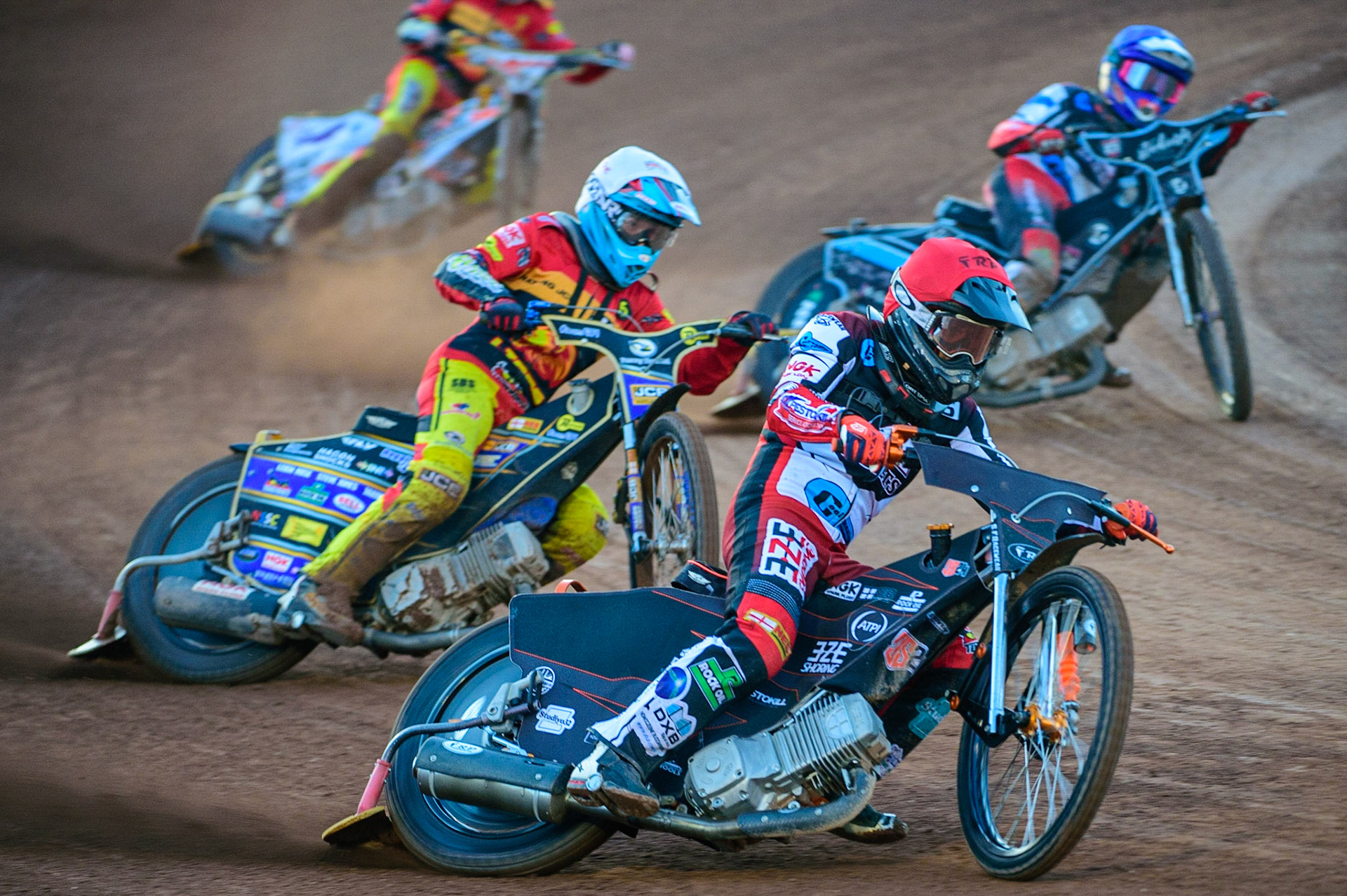 Jack Smith (Red)  outside Joe Thompson  (White)  and Freddy Hodder (Blue) during the National Development League match between Belle Vue Aces and Leicester Lions at the National Speedway Stadium, Manchester on Friday 19th August 2022. (Credit: Ian Charles | MI News)