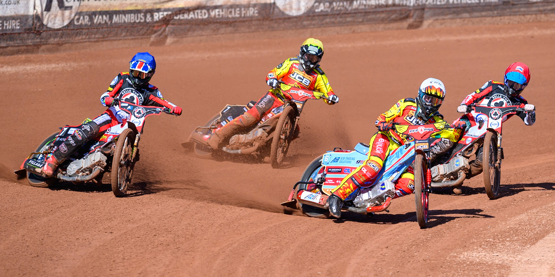 Drew Kemp of Leicester Lions  in White leading William Cairns of Belle Vue Aces  in Blue Tate Zischke of Belle Vue Aces in Red and Joe Thompson of Leicester Lions in Yellow during the Knockout Cup Northern Section match between Belle Vue Aces and Leicester Lions at the National Speedway Stadium, Manchester on Monday 6th April 2026. (Photo: Ian Charles | MI News)