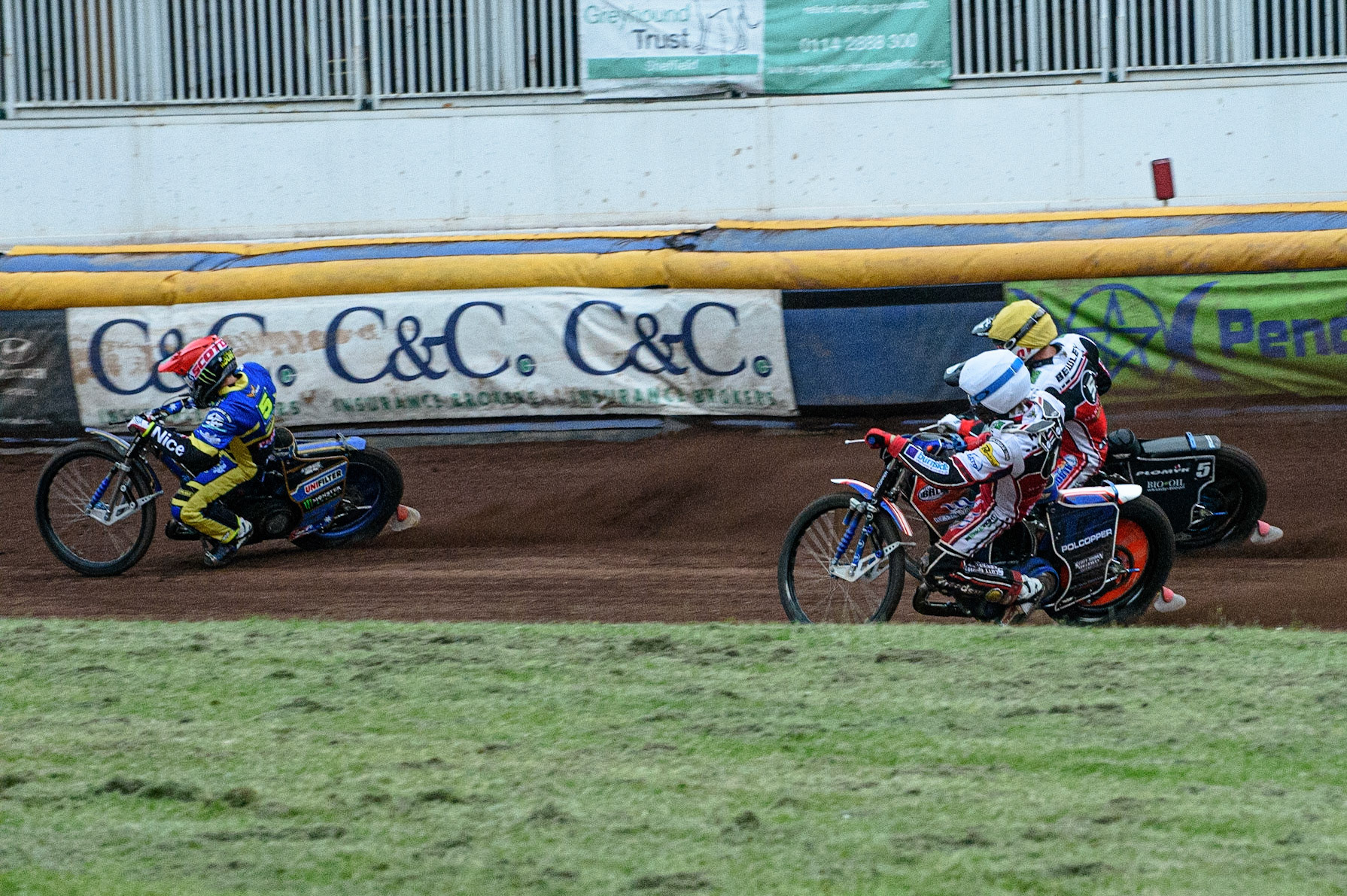 SHEFFIELD, UK. JULY 1ST     Belle Vue BikeRight Aces riders Brady Kurtz  (White) and Dan Bewley  (Yellow) chase Jack Holder  (Red) during the SGB Premiership match between Sheffield Tigers and Belle Vue Aces at Owlerton Stadium, Sheffield on Thursday 1st July 2021. (Credit: Ian Charles | MI News)