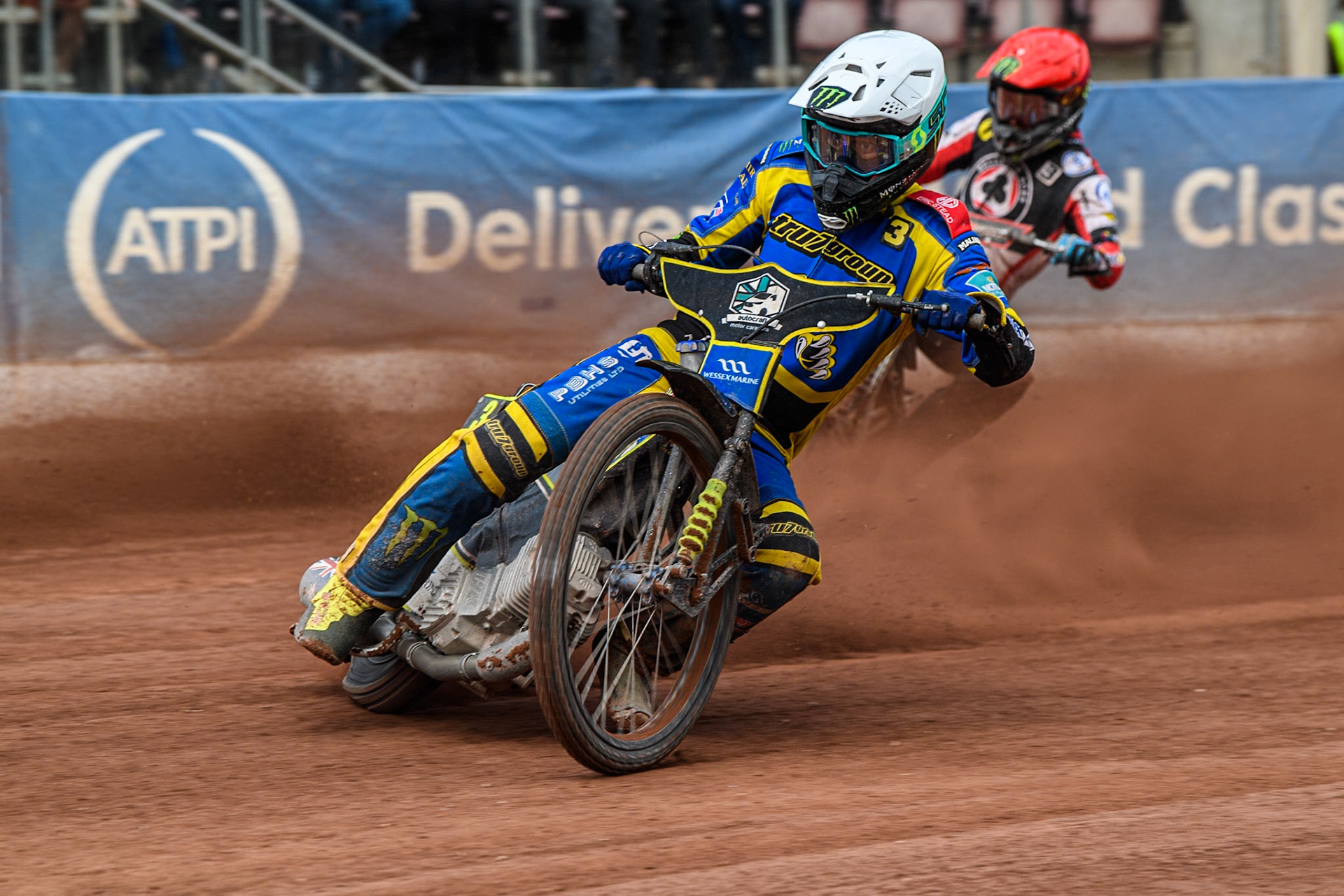 Sheffield Tigers' Chris Holder  in White leading Belle Vue Aces' Jaimon Lidsey  in Red during the Rowe Motor Oil Premiership match between Belle Vue Aces and Sheffield Tigers at the National Speedway Stadium, Manchester on Monday 26th August 2024. (Photo: Ian Charles | MI News)