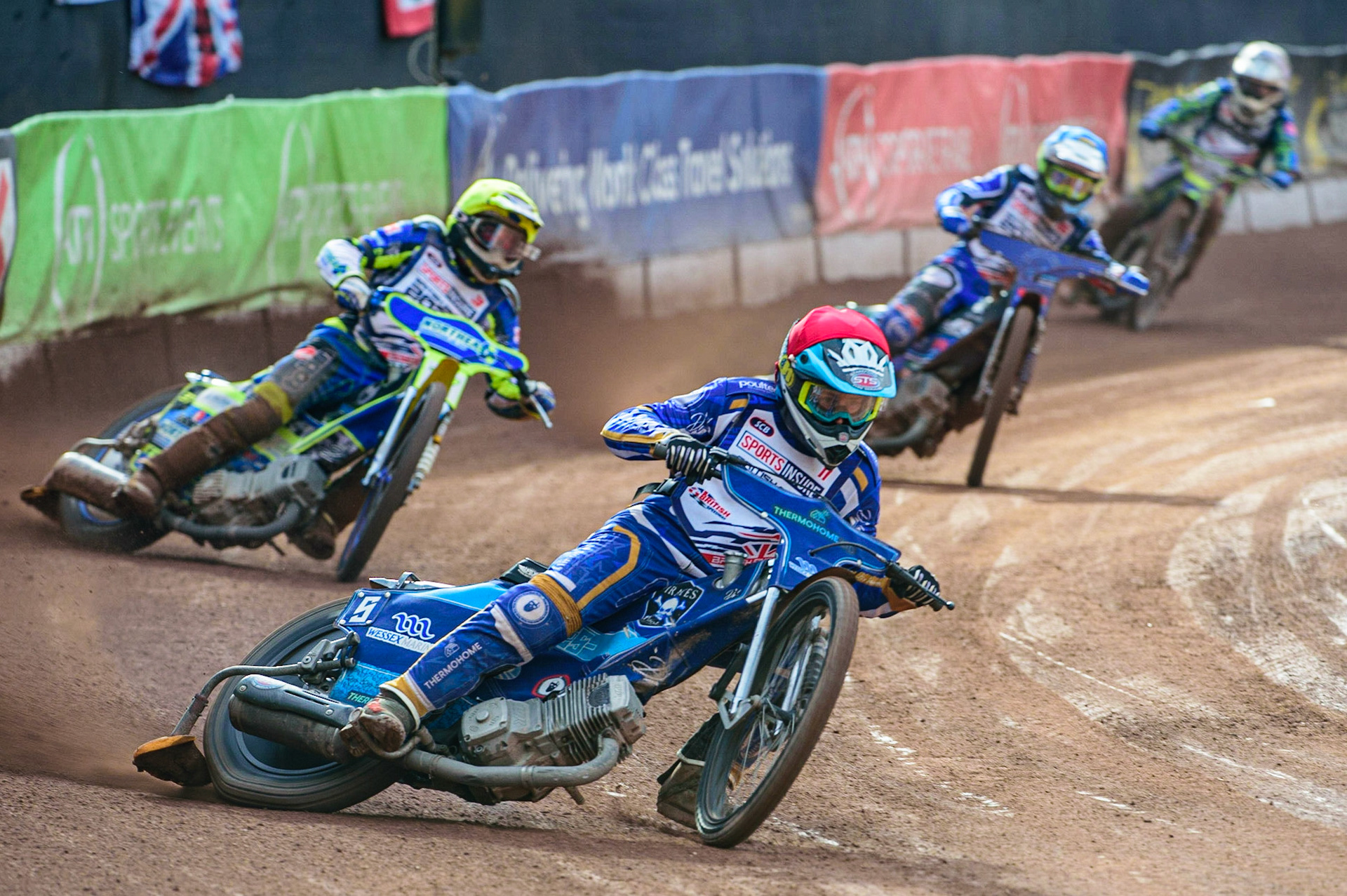 Richard Lawson  (Red) leads Chris Harris  (Yellow) Adam Ellis  (Blue) and Paul Starke (White)  during the Sports Insure British Speedway Final, at the National Speedway Stadium, Manchester, on Sunday 18th September 2022. (Credit: Ian Charles | MI News )