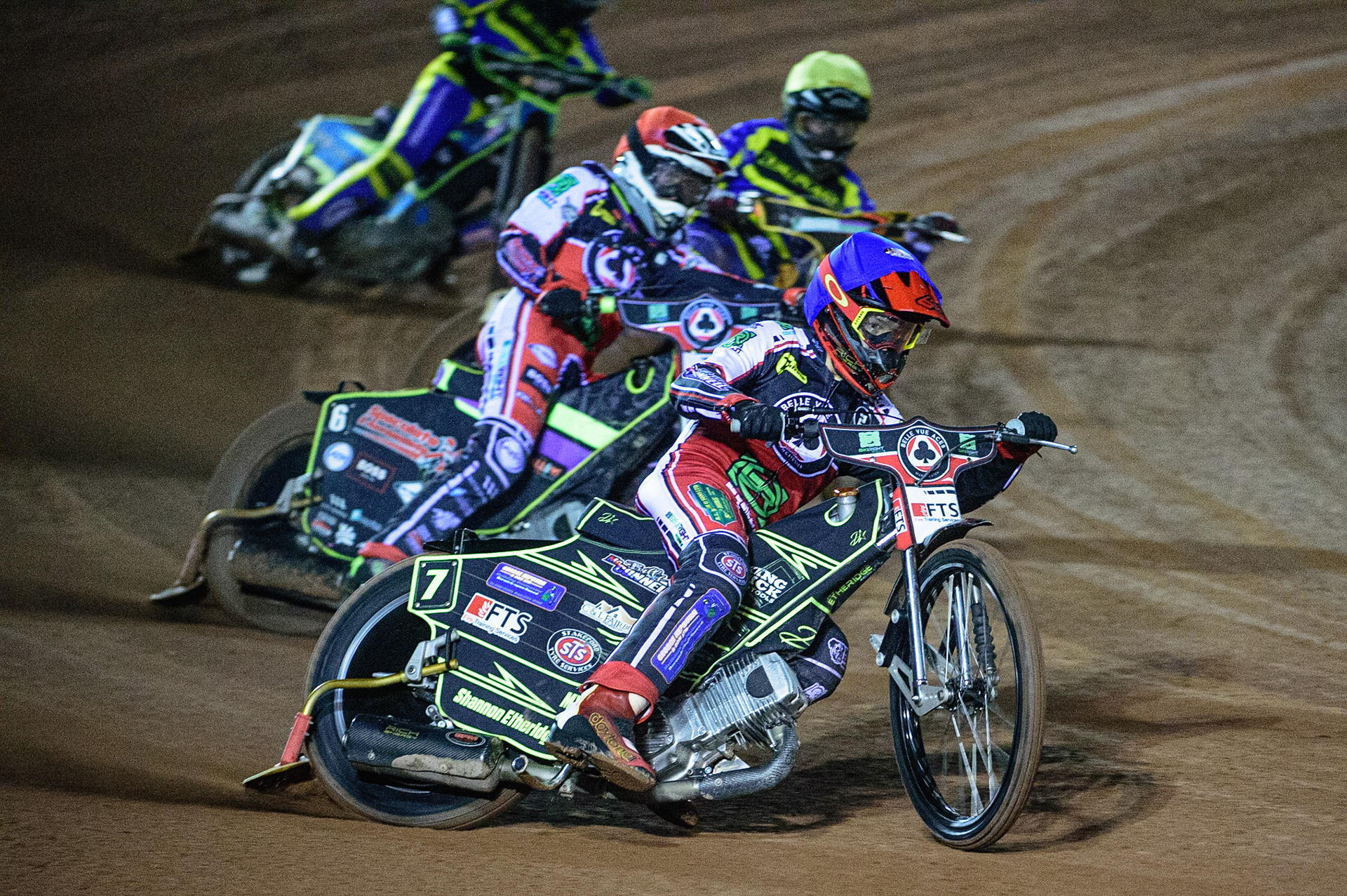 MANCHESTER, UK. OCT 7TH  Jye Etheridge   (Blue) and Tom Brennan  (Red) lead Danyon Hume (White) and Connor Mountain  (Yellow) during the SGB Premiership Play off Semi-Final Second Leg between Belle Vue Aces and Sheffield Tigers at the National Speedway Stadium, Manchester on Thursday 7th October 2021. (Credit: Ian Charles | MI News)