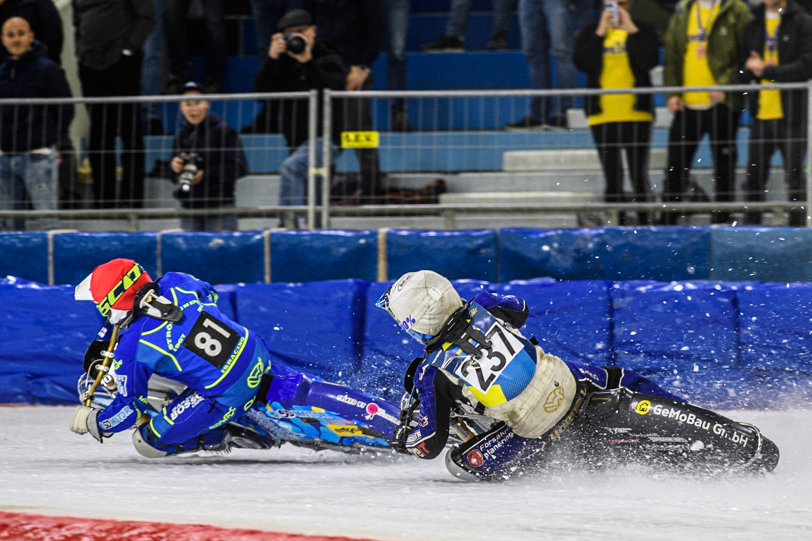 Jimmy Hörnell (237) of Sweden in White chases Jimmy Olsén (81) of Sweden in Red during the FIM Ice Speedway Gladiators World Championship, Final 4 at the Ice Stadium, Thialf, Heerenveen on Sunday 6th April 2025. (Photo: Ian Charles | MI News)