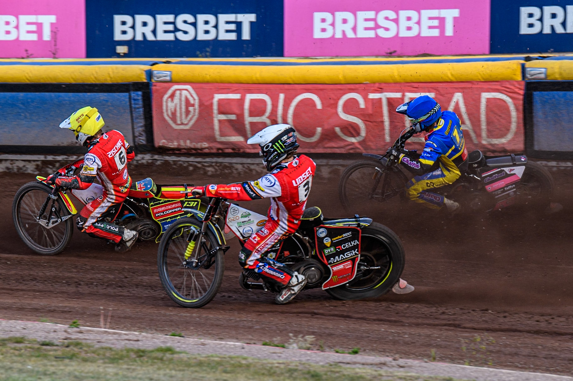Tate Zischke of Belle Vue Aces in Yellow leading Leon Flint of Sheffield Tigers in Blue and Jaimon Lidsey of Belle Vue Aces in White during the Rowe Motor Oil Premiership match between Sheffield Tigers and Belle Vue Aces at Owlerton Stadium, Sheffield on Monday 5th May 2025. (Photo: Ian Charles | MI News)