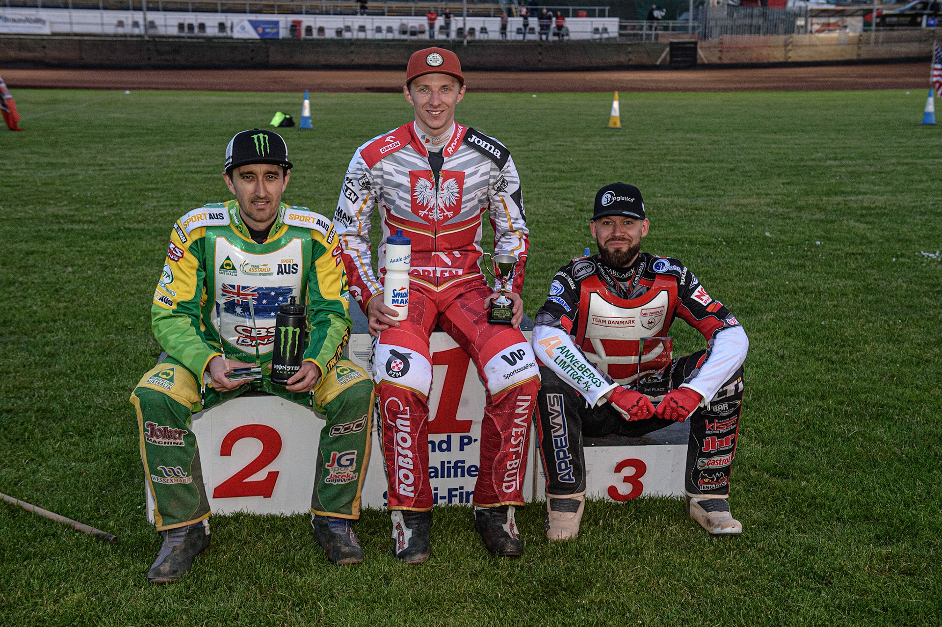 GLASGOW, UK. JUNE 19TH.  TOP 3 at Ashfield: (L-r) Chris Holder (Australia) (2nd), Tobiasz Musielak (Poland) (Winner), Nicolai Klindt (Denmark) (3rd)  during the FIM Speedway Grand Prix Qualifying Round at the Peugeot Ashfield Stadium, Glasgow on Saturday 19th June 2021. (Credit: Ian Charles | MI News)
