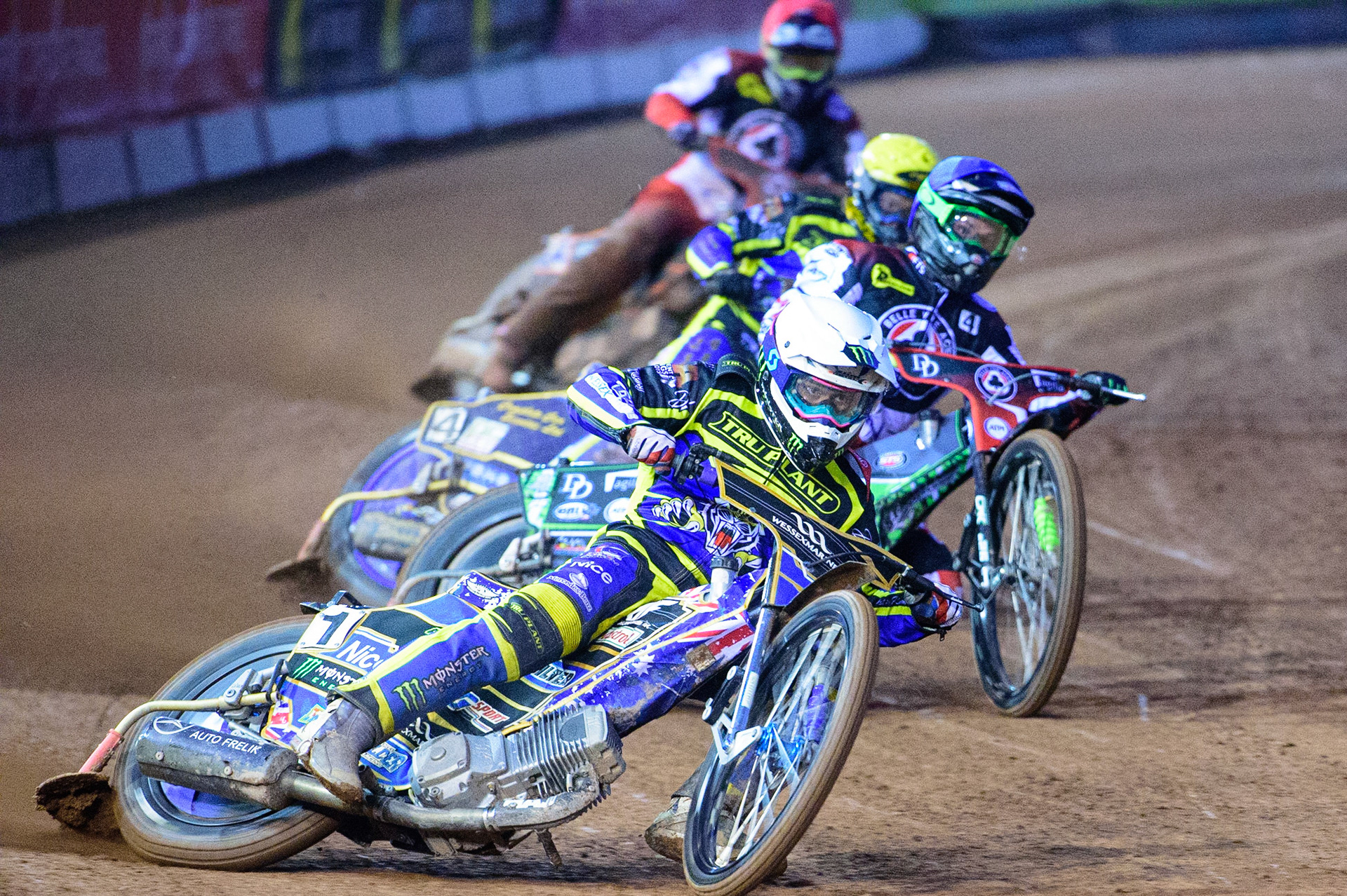 MANCHESTER, UK.  MAR 28TH.  Jack Holder of Sheffield (White) leads Charles Wright of Belle Vue  (Blue), Kyle Howarth of Sheffield  (Yellow) and Jake Allen of Belle Vue (Red)during the SGB Premiership League Cup match between Belle Vue Aces and Sheffield Tigers at the National Speedway Stadium, Manchester on Monday 28th March 2022. (Credit: Ian Charles | MI News)