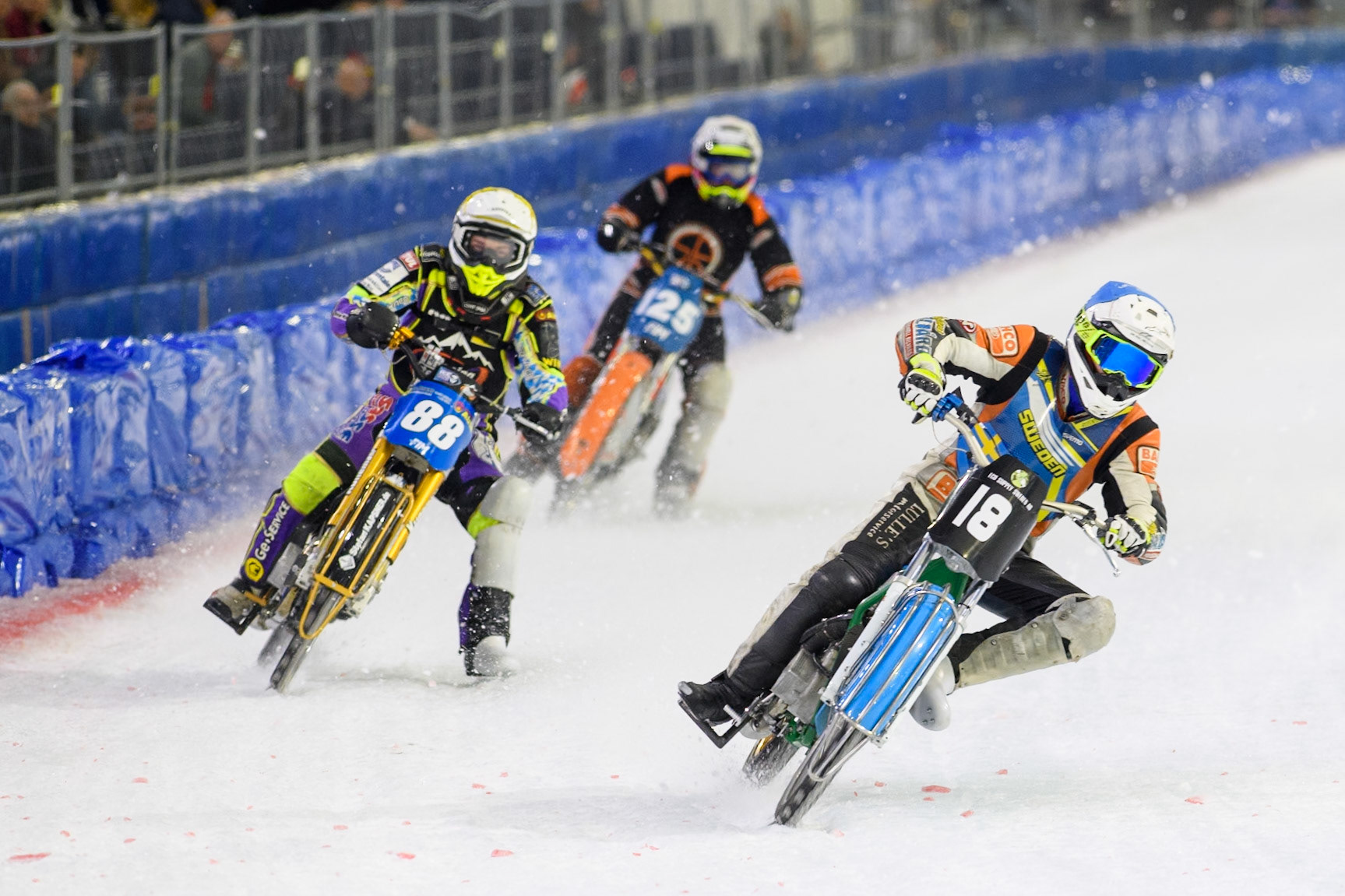Reserve Melwin Björklin (18) of Sweden in Blue leading Max Niedermaier  (88) of Germany in Yellow and Sebastian Reitsma (125) of The Netherlands in White during the FIM Ice Speedway Gladiators World Championship, Final 4 at the Ice Stadium, Thialf, Heerenveen on Sunday 6th April 2025. (Photo: Ian Charles | MI News)