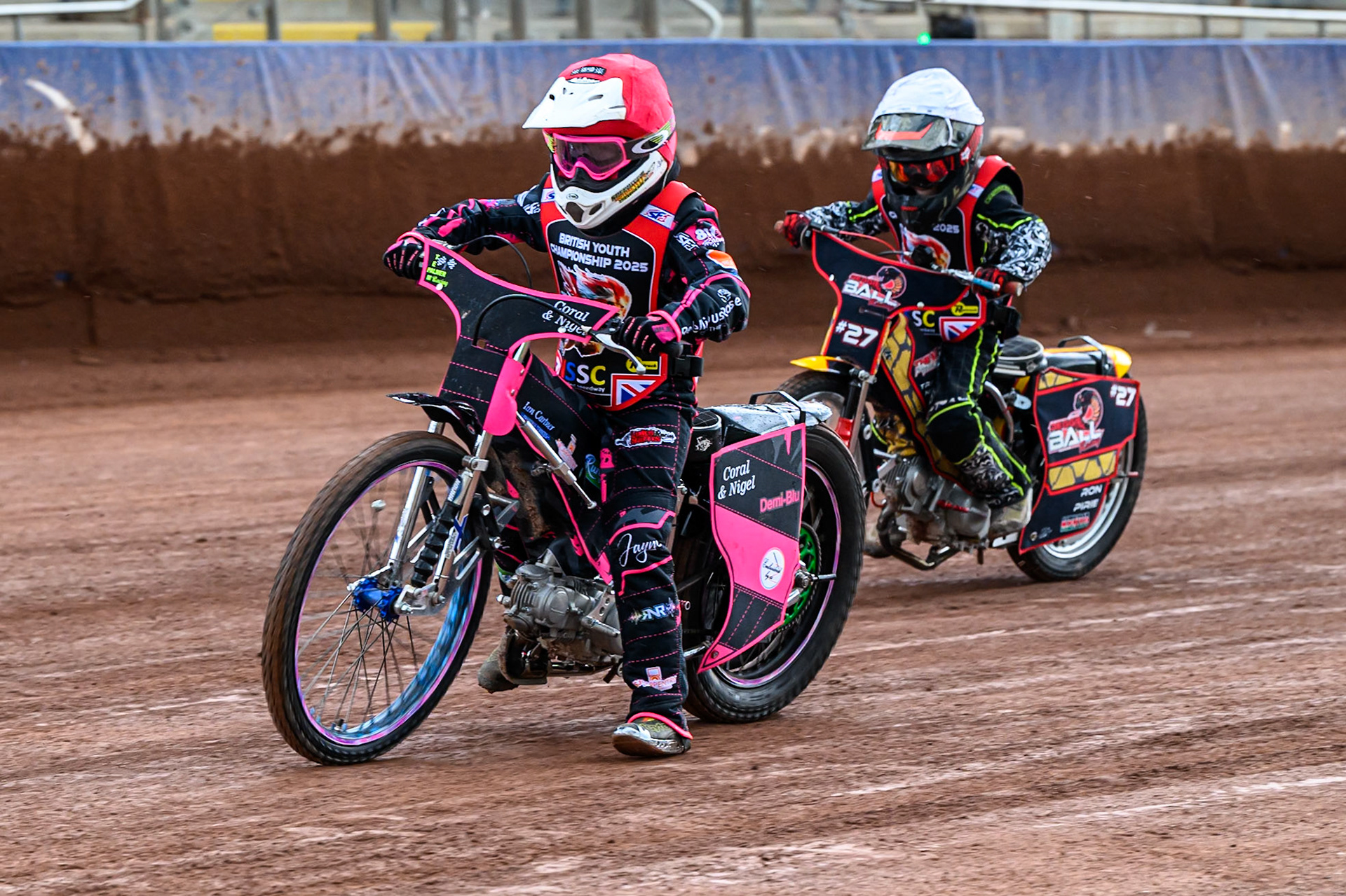 Support Class Jessica Cox (61) in Red leading Reggie Ball (27) in White during the British Youth Championship (125cc) Round 2A, at the National Speedway Stadium, Manchester on Sunday 1st June 2025. (Photo: Ian Charles | MI News)