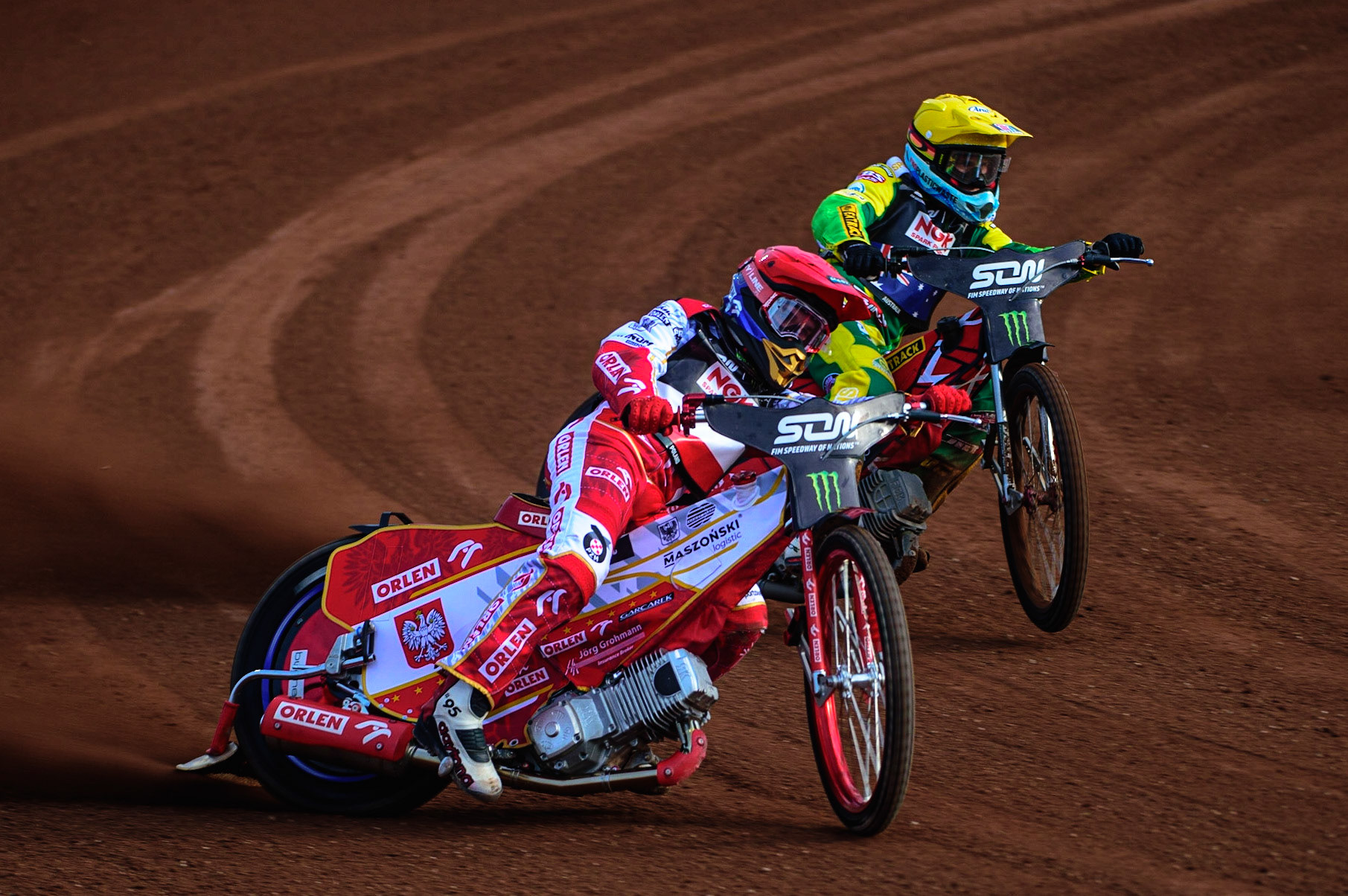 MANCHESTER, UK. OCT 16TH Bartosz Zmarzlik of Poland (Red) outside Max Fricke of Australia (Yellow) during the Monster Energy FIM Speedway of Nations at the National Speedway Stadium, Manchester on Saturday  16th October 2021. (Credit: Ian Charles | MI News)