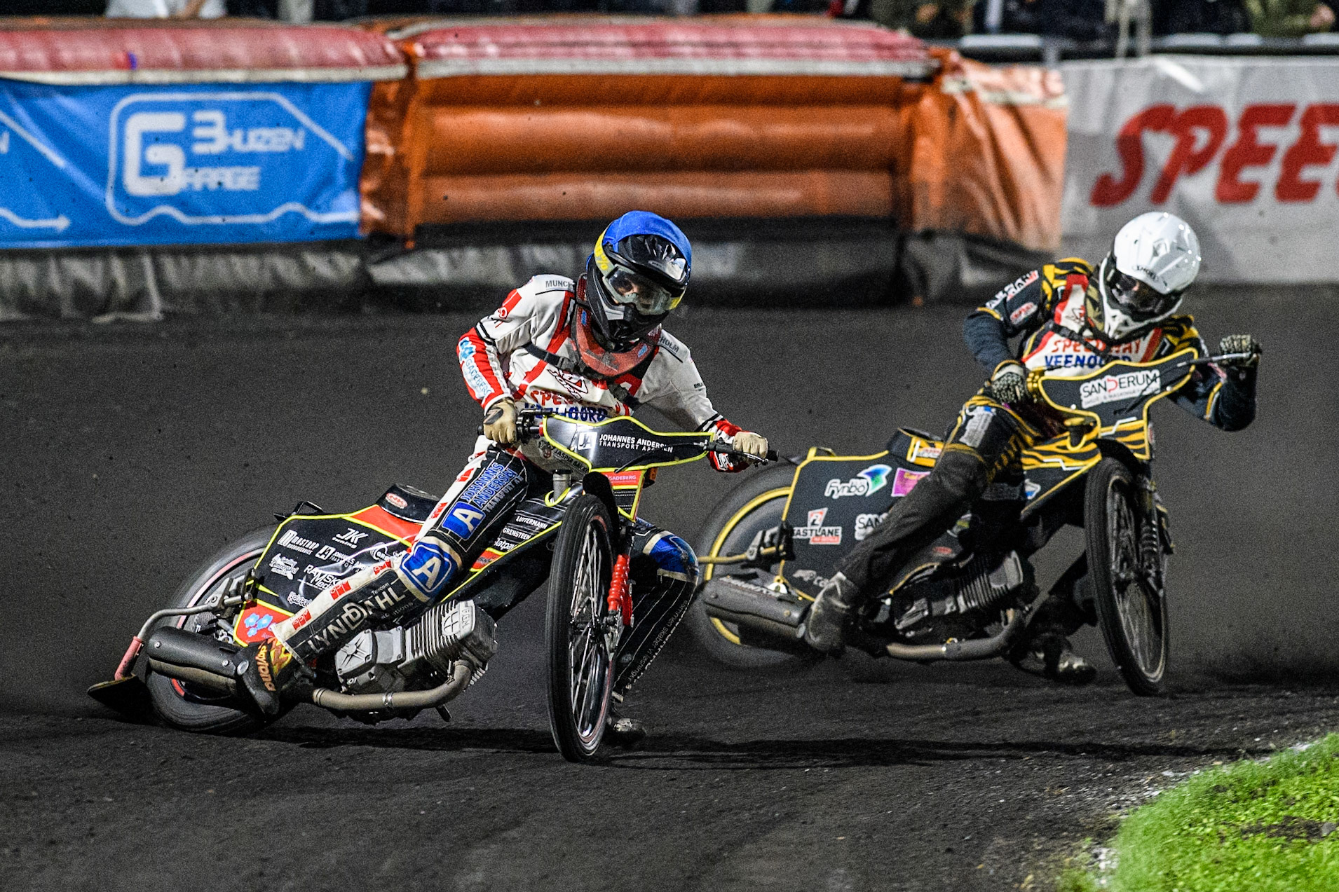 Patrick Baek of Denmark in Blue leading Victor Larsen of Denmark in White during the Golden JOPA Helmet at Sportpark Veenoord, Veenoord, Netherlands on Saturday 21st September 2024. (Photo: Ian Charles | MI News)