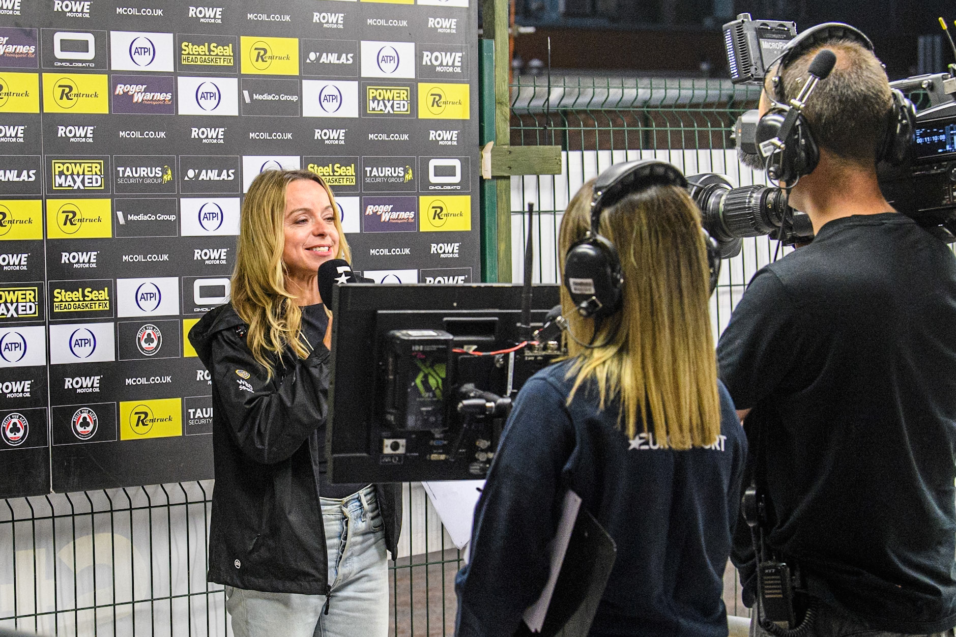 Eurosport presenter Abi Stephens does a piece to Camera during the Rowe Motor Oil Premiership match between Belle Vue Aces and King's Lynn Stars at the National Speedway Stadium, Manchester on Monday 12th August 2024. (Photo: Ian Charles | MI News)