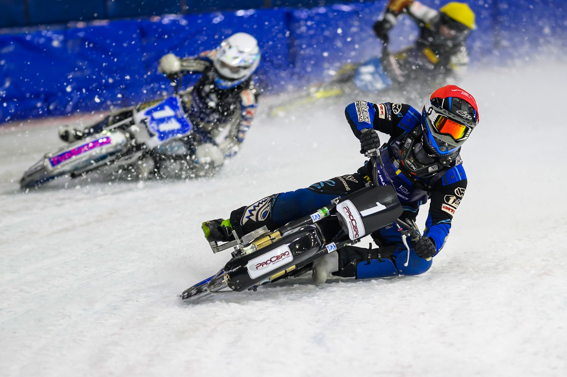 Niclas Svensson (1) of Sweden  in Red leading Max Koivula (11) of Finland  in White and Heikki Huusko (12) of Finland  in Yellow during the FIM Ice Speedway Of Nations at Ice Rink Thialf, Heerenveen on Sunday 12th April 2026. (Photo: Ian Charles | MI News)