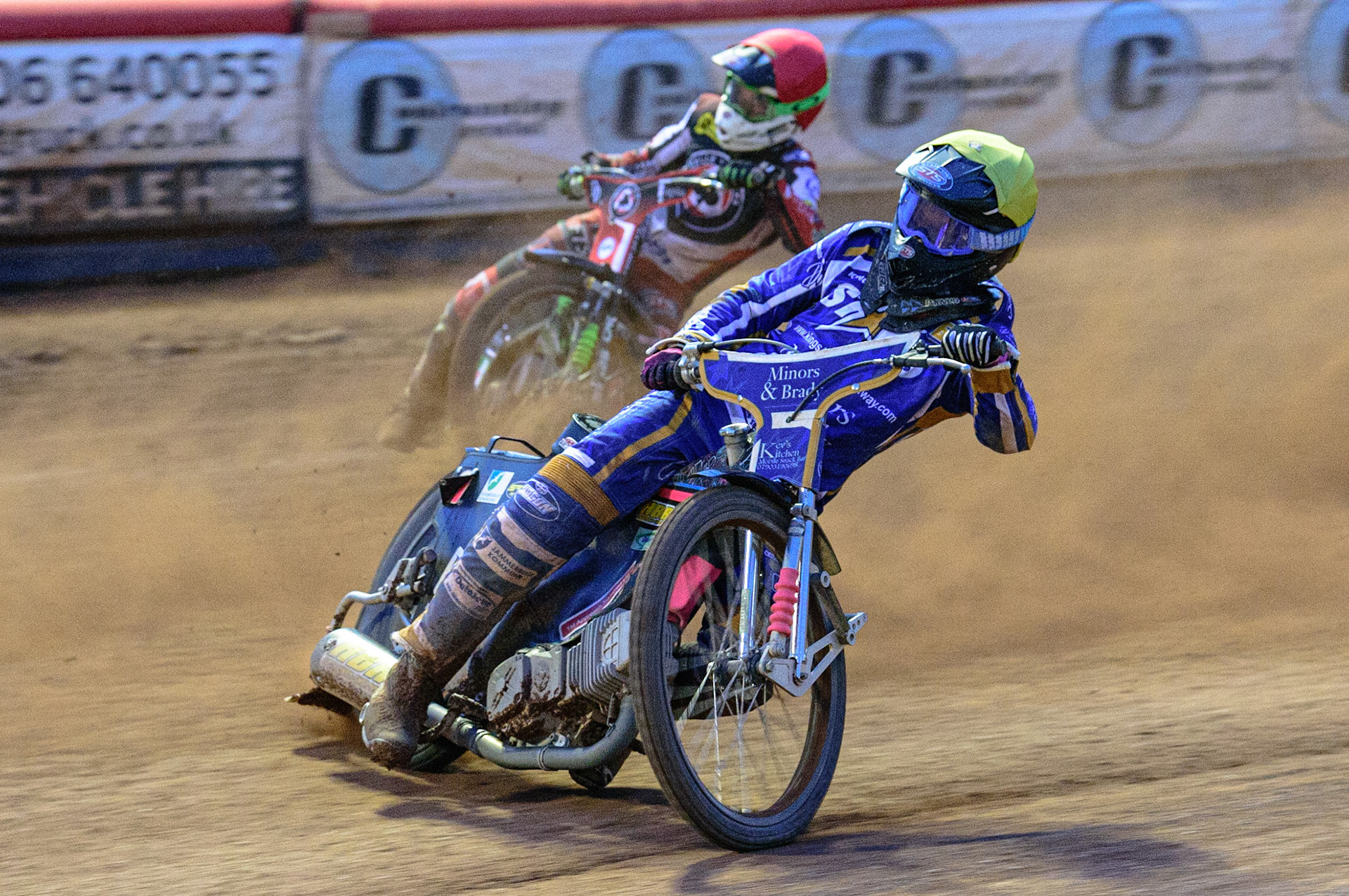 MANCHESTER UK  Thomas Jorgensen  (Yellow) leads Charles Wright  (Red) during the SGB Premiership match between Belle Vue Aces and King's Lynn Stars at the National Speedway Stadium, Manchester on Monday 11th July 2022. (Credit: Ian Charles | MI News)