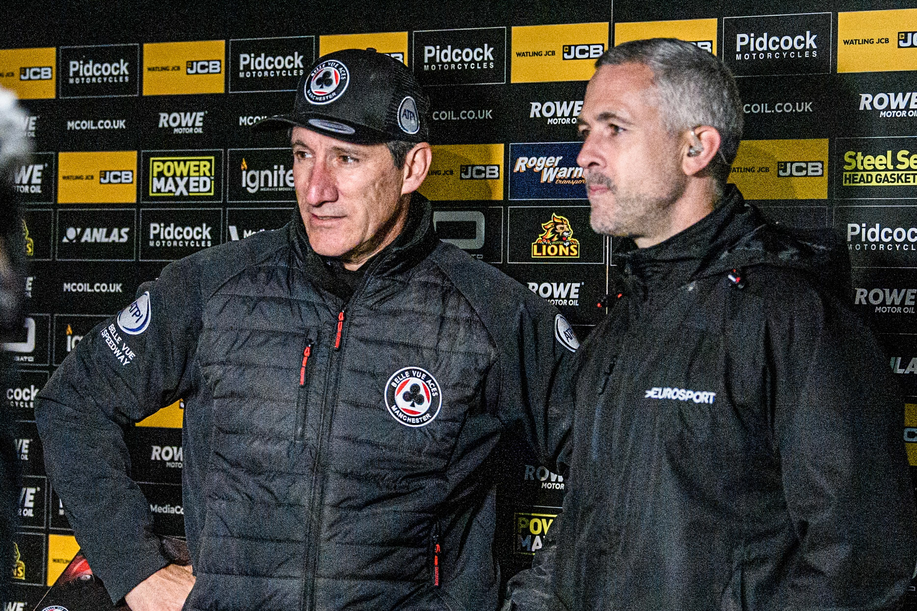 Belle Vue Aces' Team Manager Mark Lemon (Left) waits to be interviewed bt Scott Nicholls during the Rowe Motor Oil Premiership Grand Final 2nd Leg between Leicester Lions and Belle Vue Aces at the Pidcock Motorcycles Arena, Leicester on Thursday 26th September 2024. (Photo: Ian Charles | MI News)