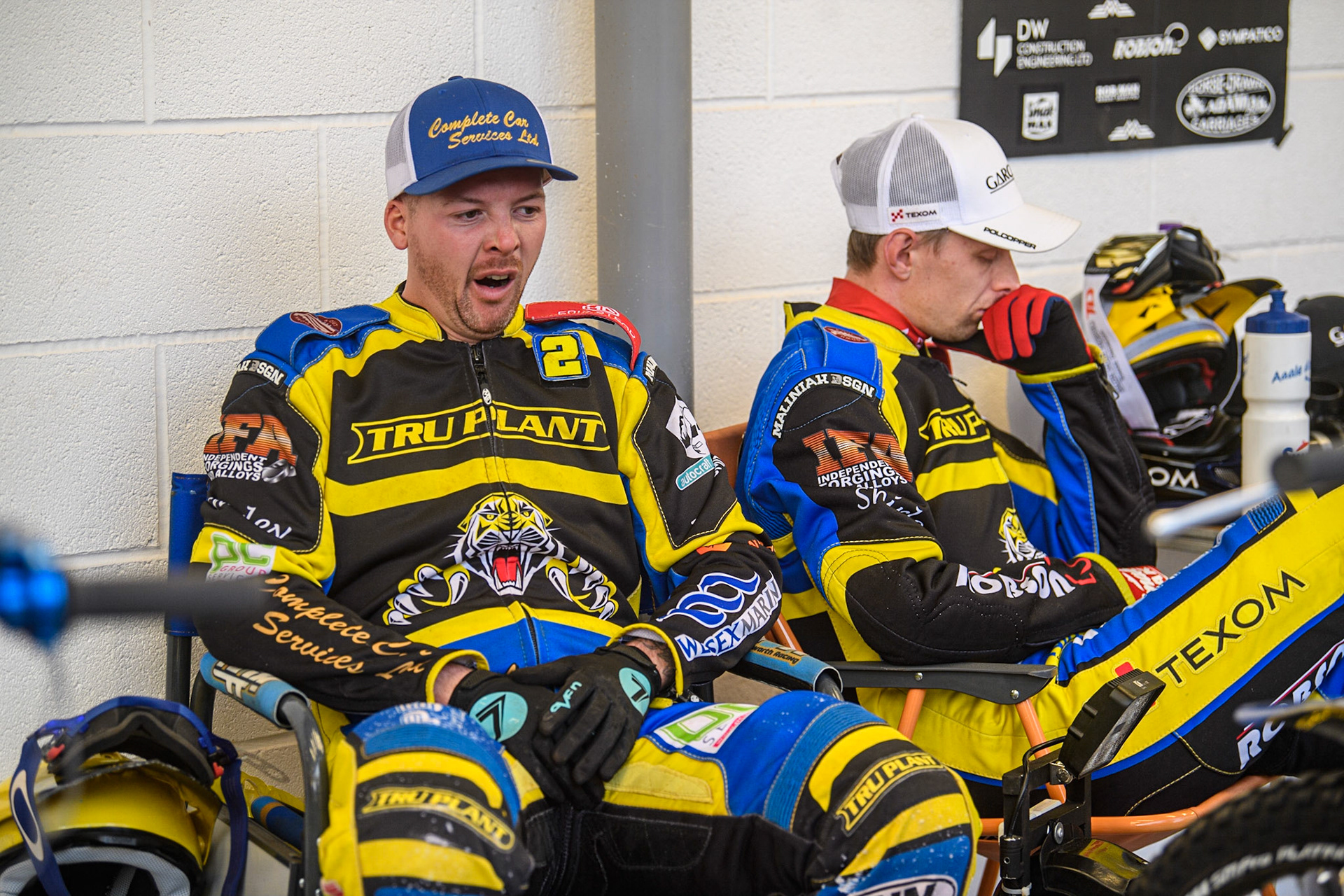 Kyle Howarth (left) and Tobiasz Musielak relax before the meeting during the Sports Insure Premiership match between Belle Vue Aces and Sheffield Tigers at the National Speedway Stadium, Manchester on Monday 7th August 2023. (Photo: Ian Charles | MI News)