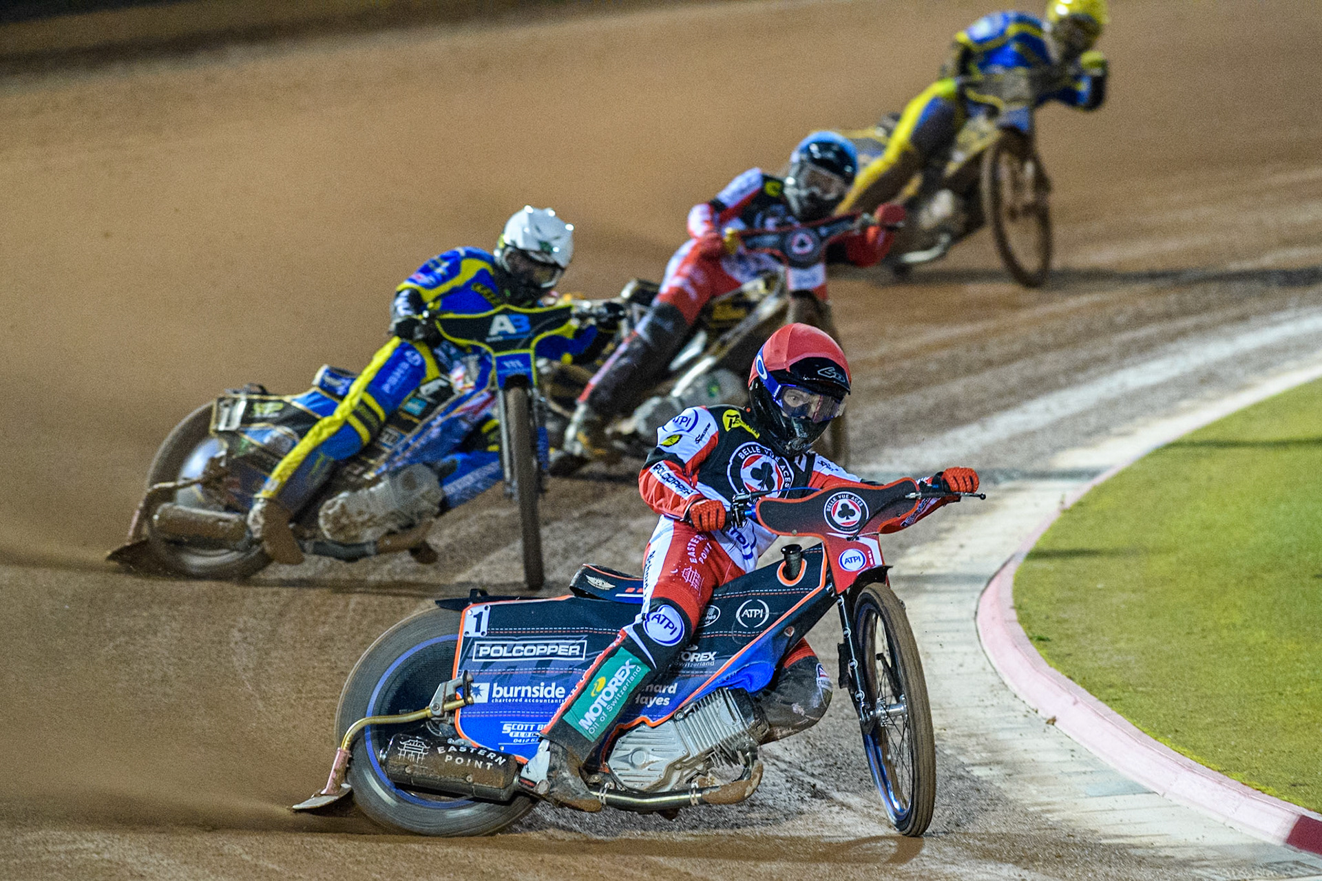 Belle Vue Aces' Brady Kurtz  in Red leading Sheffield Tigers' Jack Holder  in White, Belle Vue Aces' Norick Blodorn  in Blue and Sheffield Tigers' Kyle Howarth  in Yellow during the Rowe Motor Oil Premiership Play Off Semi Final 2, 1st Leg match between Belle Vue Aces and Sheffield Tigers at the National Speedway Stadium, Manchester on Monday 16th September 2024. (Photo: Ian Charles | MI News)