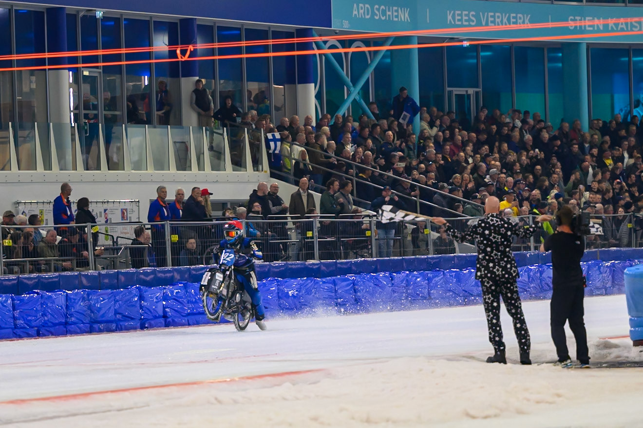 Niclas Svensson (192) of Sweden  crosses the finish line as meeting winner and the New World Champion during the FIM Ice Speedway Gladiators World Championship Final 3 at Ice Rink Thialf, Heerenveen on Saturday 11th April 2026. (Photo: Ian Charles | MI News)