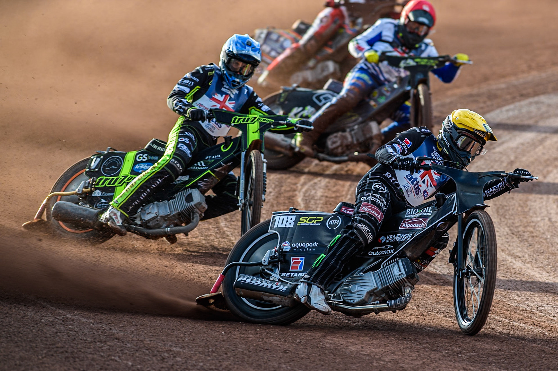 Tai Woffinden in Yellow leading Adam Ellis in Blue and Craig Cook in Red during the Attis Insurance Sports Division British Speedway Championship Final at the National Speedway Stadium, Manchester on Saturday 8th June 2024. (Photo: Ian Charles | MI News)