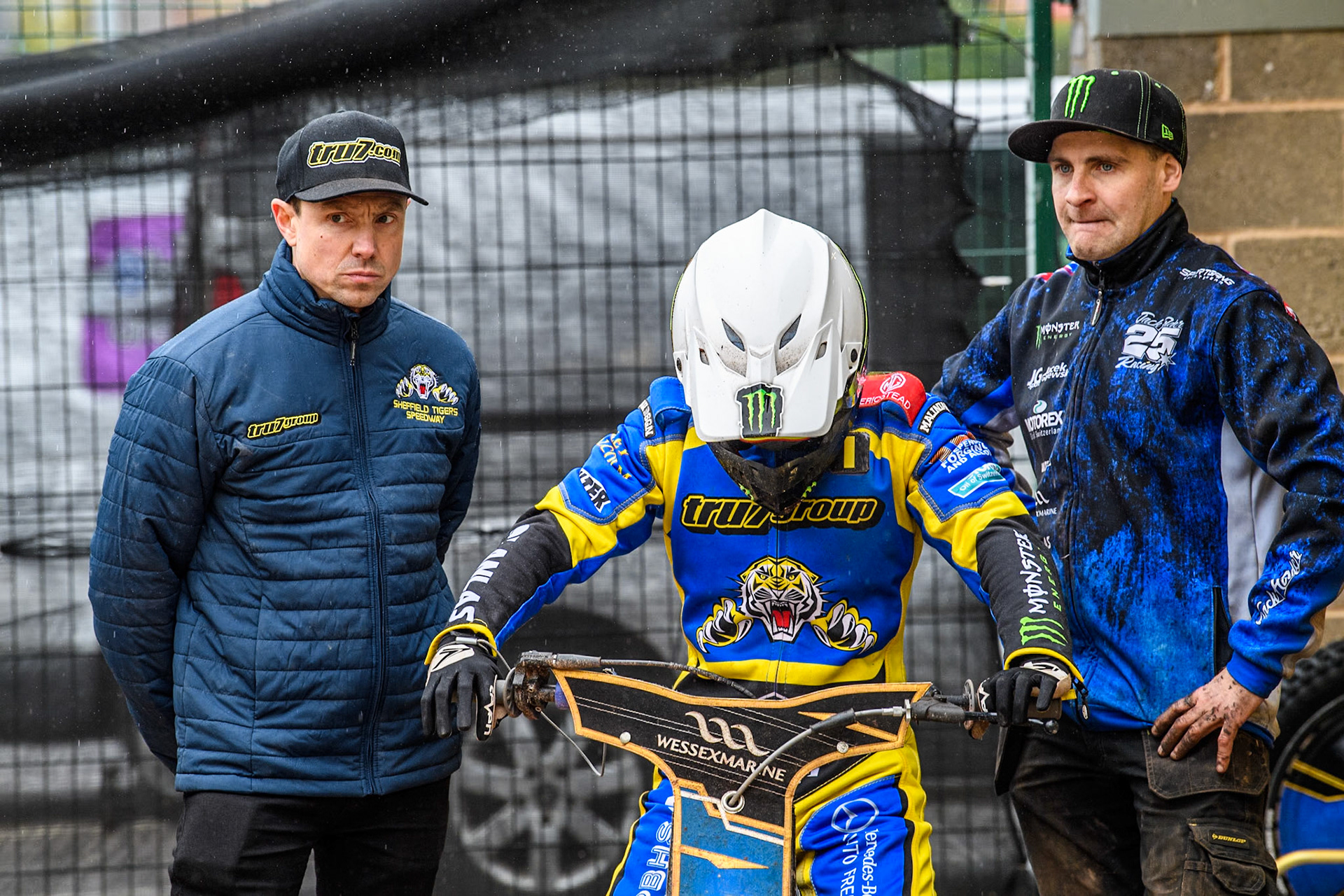 Sheffield Tigers' Team Manager Simon Stead (Left) with Sheffield Tigers' Jack Holder (Centre) and Holder’s mechanic as he waits to go out for the final heat  during the Rowe Motor Oil Premiership KO Cup Quarter Final 1st Leg between Belle Vue Aces and Sheffield Tigers at the National Speedway Stadium, Manchester on Monday 1st April 2024. (Photo: Ian Charles | MI News)