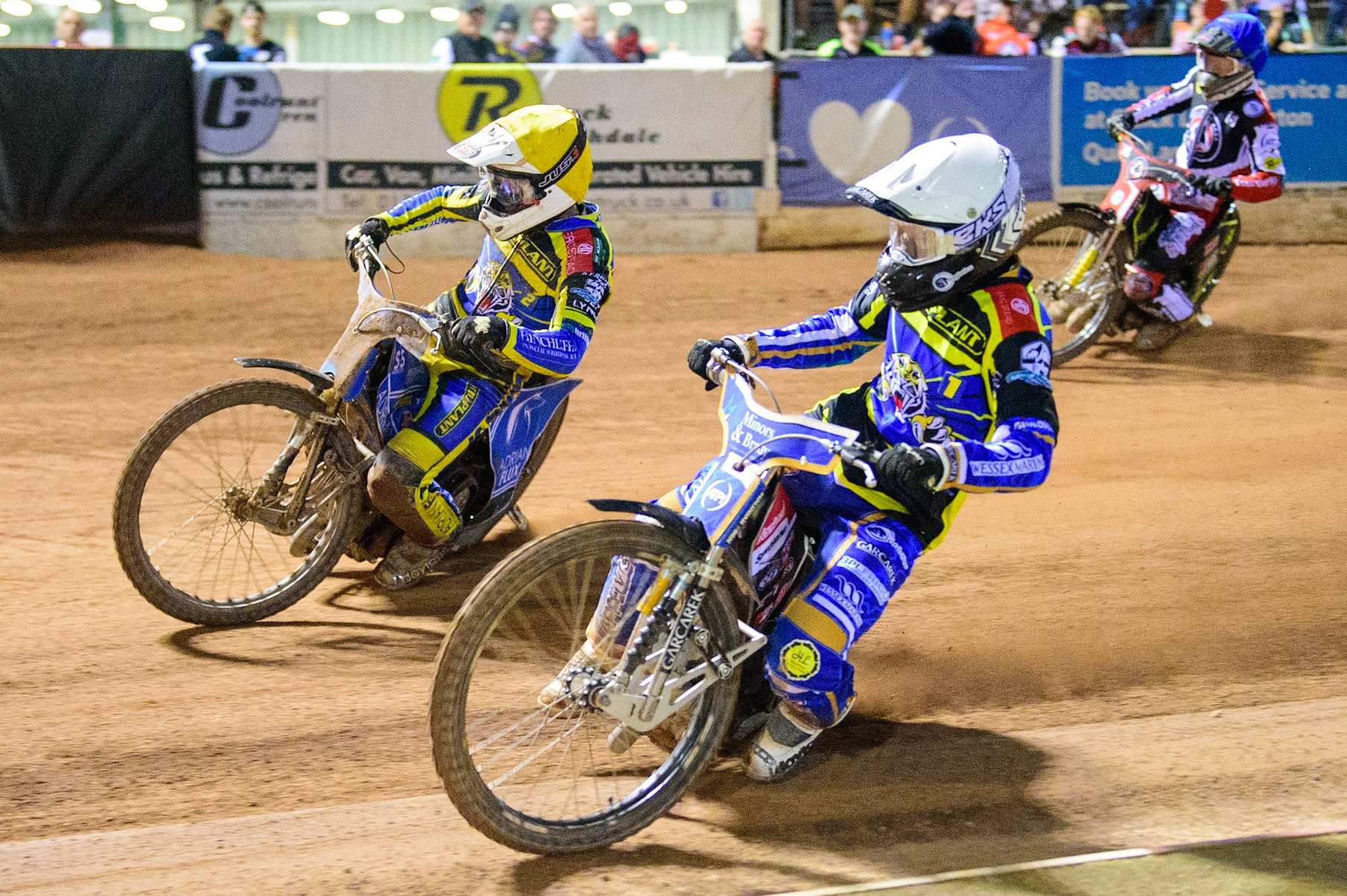 Nikolai Klindt  (White) and Lewis Kerr  (Yellow) leads Jye Etheridge  (Blue) during the SGB Premiership match between Belle Vue Aces and Sheffield Tigers at the National Speedway Stadium, Manchester on Monday 5th September 2022. (Credit: Ian Charles | MI News)