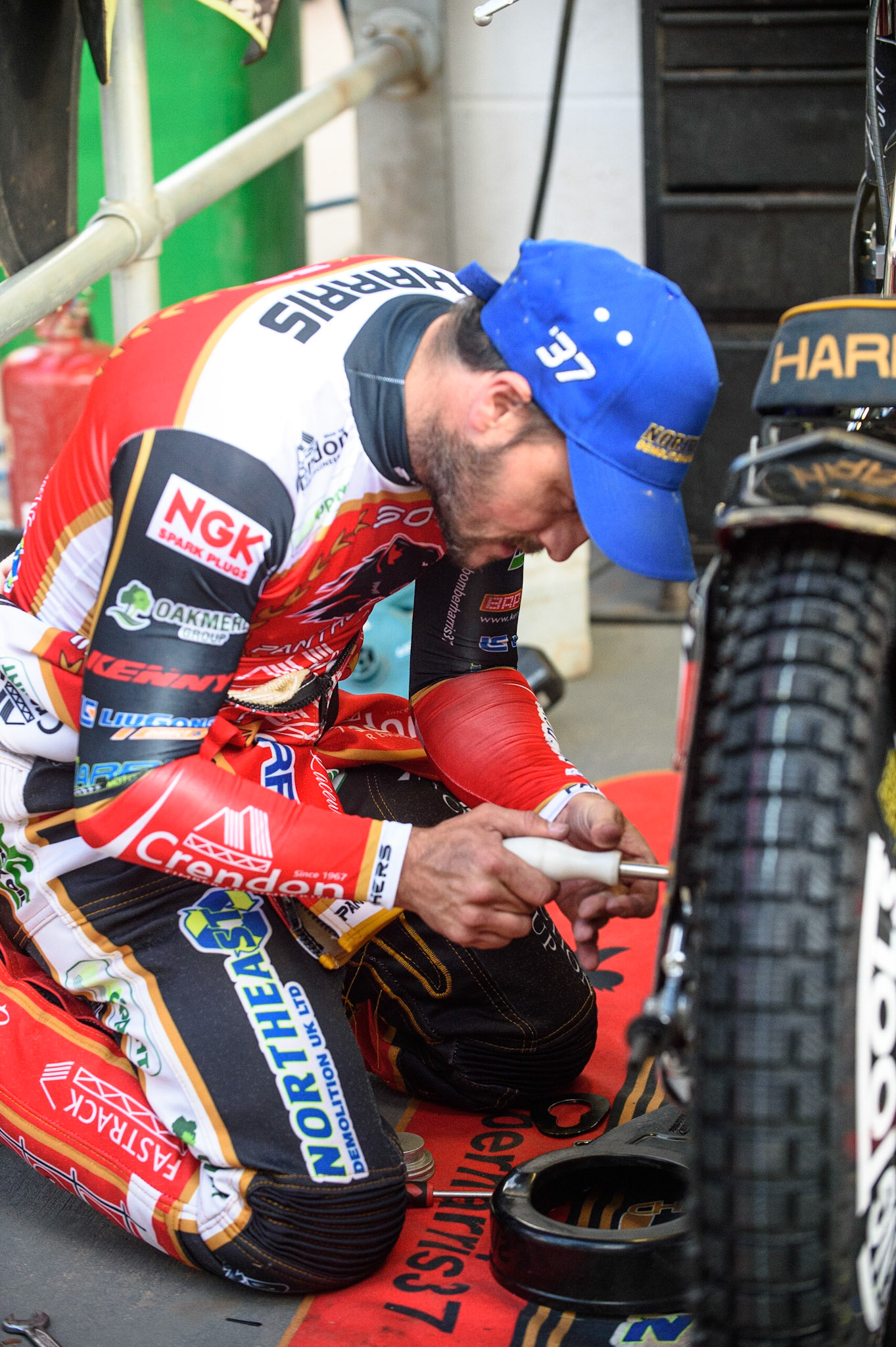 MANCHESTER, UK. AUG 9TH  Chris Harris  works on his bike during the SGB Premiership match between Belle Vue Aces and Peterborough at the National Speedway Stadium, Manchester on Monday 9th August 2021. (Credit: Ian Charles | MI News)