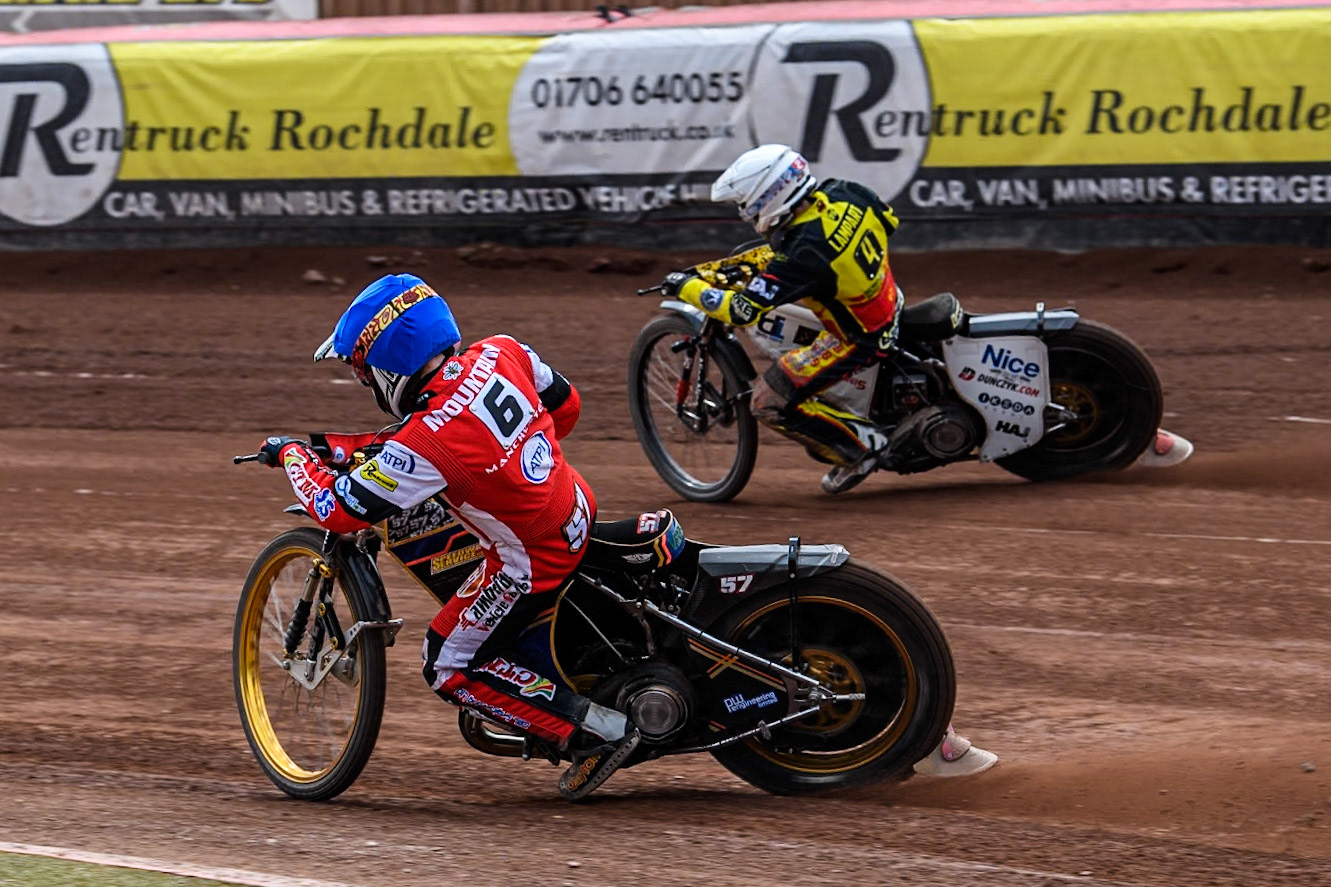 Belle Vue Aces' Connor Mountain  in Blue rides inside Birmingham Brummies' Wiktor Lampart  in White during the Rowe Motor Oil Premiership match between Belle Vue Aces and Birmingham Brummies at the National Speedway Stadium, Manchester on Monday 6th May 2024. (Photo: Ian Charles | MI News)