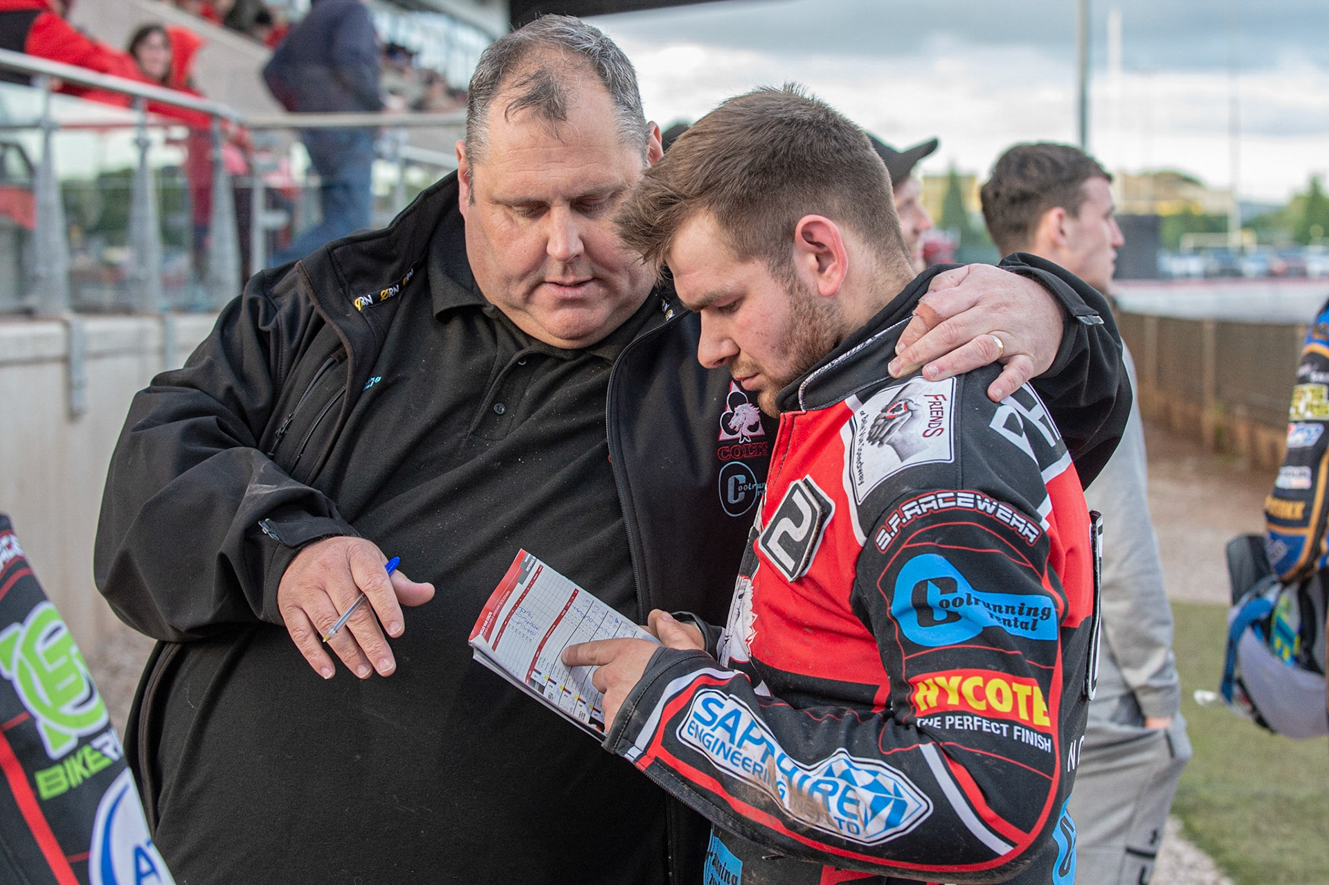 Photo: Ian Charles

Belle Vue Colts Co-Manager Steve Williams  (left) with Danny Phillips  as they check their programme

Belle Vue Colts v Kent Kings, SGB National League KO Cup Quarter Final 1st Leg, Belle Vue National Speedway Stadium, Manchester, Thursday 20  June  2019