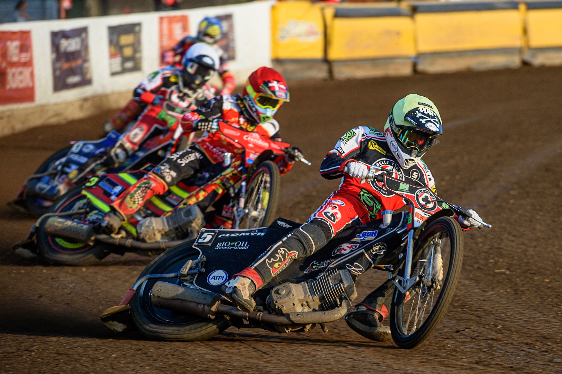 PETERBOROUGH, UK. JULY 19TH   Dan Bewley  (Yellow) on his way to breaking the Peterborough track record as he leads Michael Palm-Toft  (Red) Brady Kurtz  (White) and Scott Nicholls   (Blue)during the SGB Premiership match between Peterborough and Belle Vue Aces at East of England Showground, Peterborough on Monday 19th July 2021. (Credit: Ian Charles | MI News)