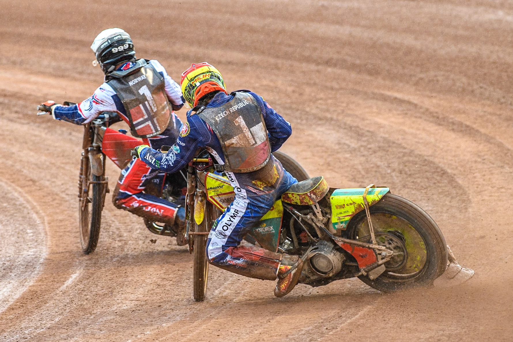 Vaclav Milik of The Czech Republic in Red chases Mathias Pollestad of Norway in White during the Monster Energy FIM Speedway of Nation Semi Final 2 at the National Speedway Stadium, Manchester on Wednesday 10th July 2024. (Photo: Ian Charles | MI News)