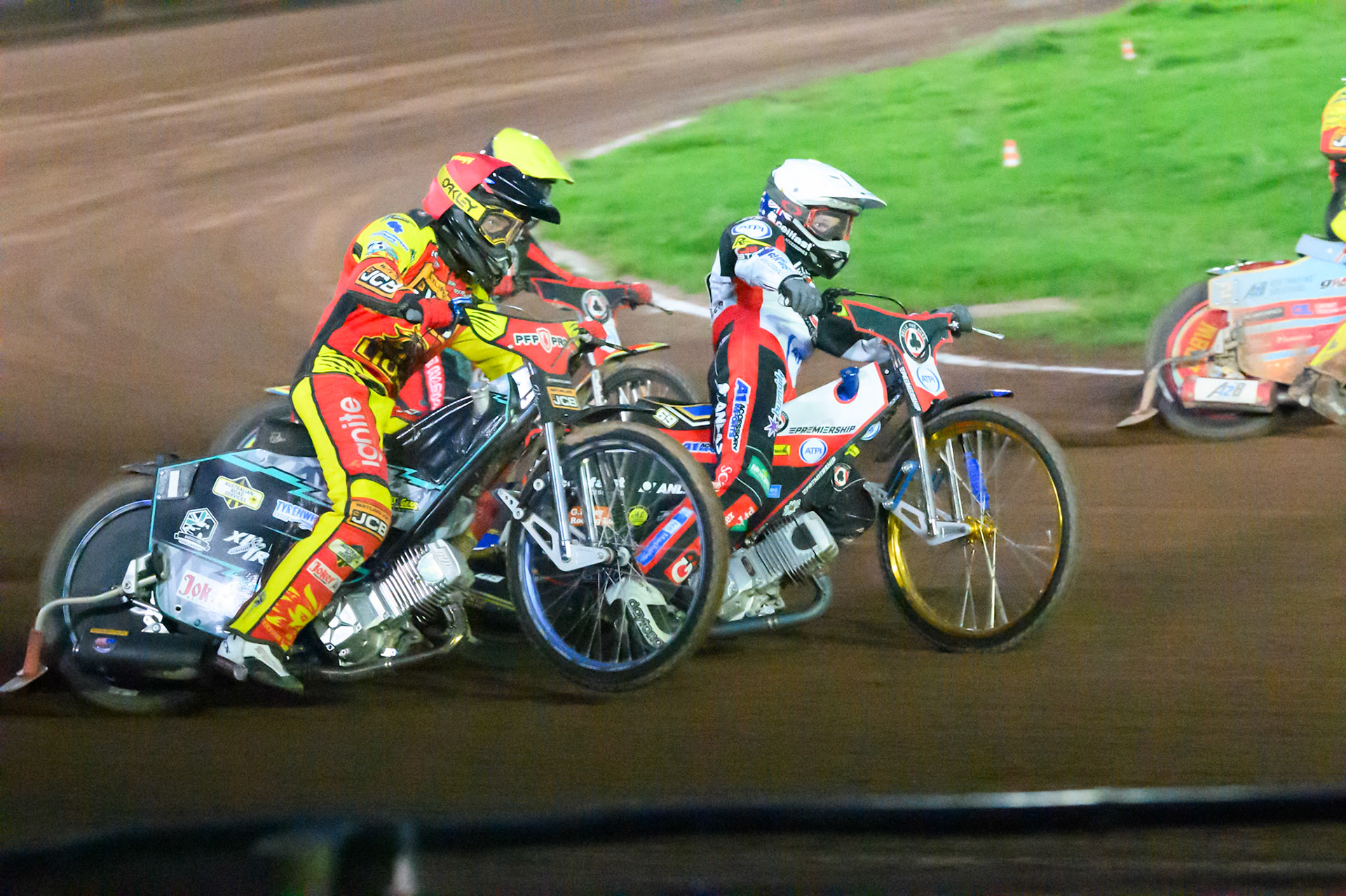 Ryan Douglas of Leicester Lions in Red rides outside Jason Doyle of Belle Vue Aces  in White  and Tate Zischke of Belle Vue Aces  in Yellow during the Rowe Motor Oil Premiership match between Leicester Lions and Belle Vue Aces at the Hydroscan Arena, Leicester on Monday 7th September 2026. (Photo: Ian Charles | MI News)