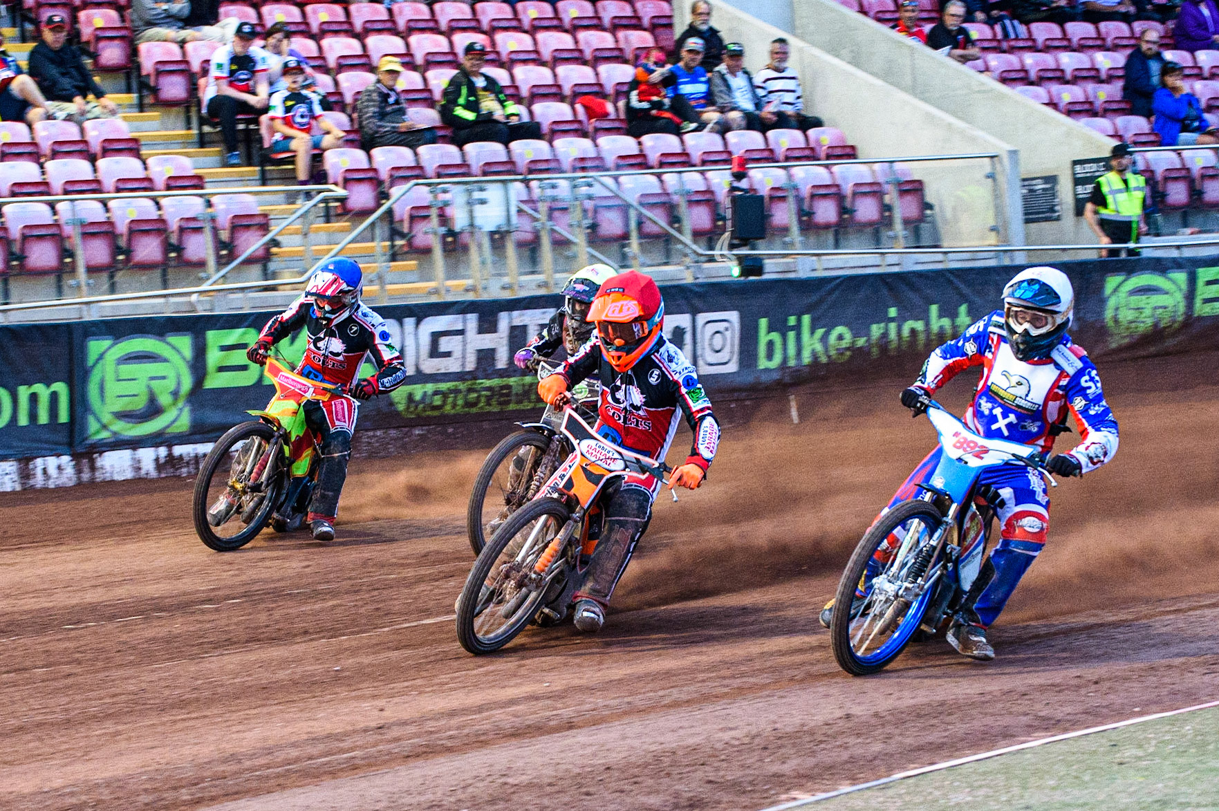 MANCHESTER, UK. JULY 23RD Jake Knight  (White) inside Connor Coles  (Red) with Ben Woodhull  (Blue) and Connor King  (Yellow) behind during the National Development League match between Belle Vue Colts and Eastbourne Seagulls at the National Speedway Stadium, Manchester on Friday 23rd July 2021. (Credit: Ian Charles | MI News)