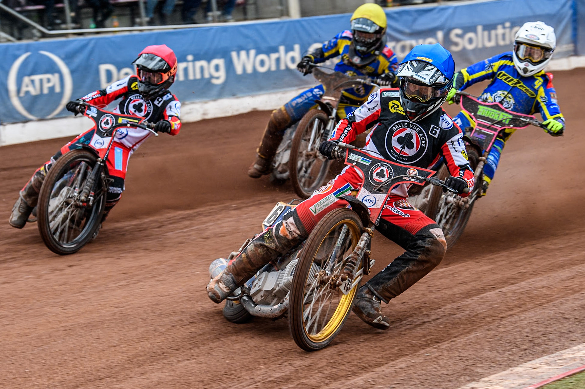 Belle Vue ATPI Aces Connor Mountain (Blue) leads  Belle Vue ATPI Aces Ben Cook (Red), Sheffield Tigers' Josh Pickering (White) and Sheffield Tigers' Dan Gilkes (Yellow) during the Rowe Motor Oil Premiership KO Cup Quarter Final 1st Leg between Belle Vue Aces and Sheffield Tigers at the National Speedway Stadium, Manchester on Monday 1st April 2024. (Photo: Ian Charles | MI News)